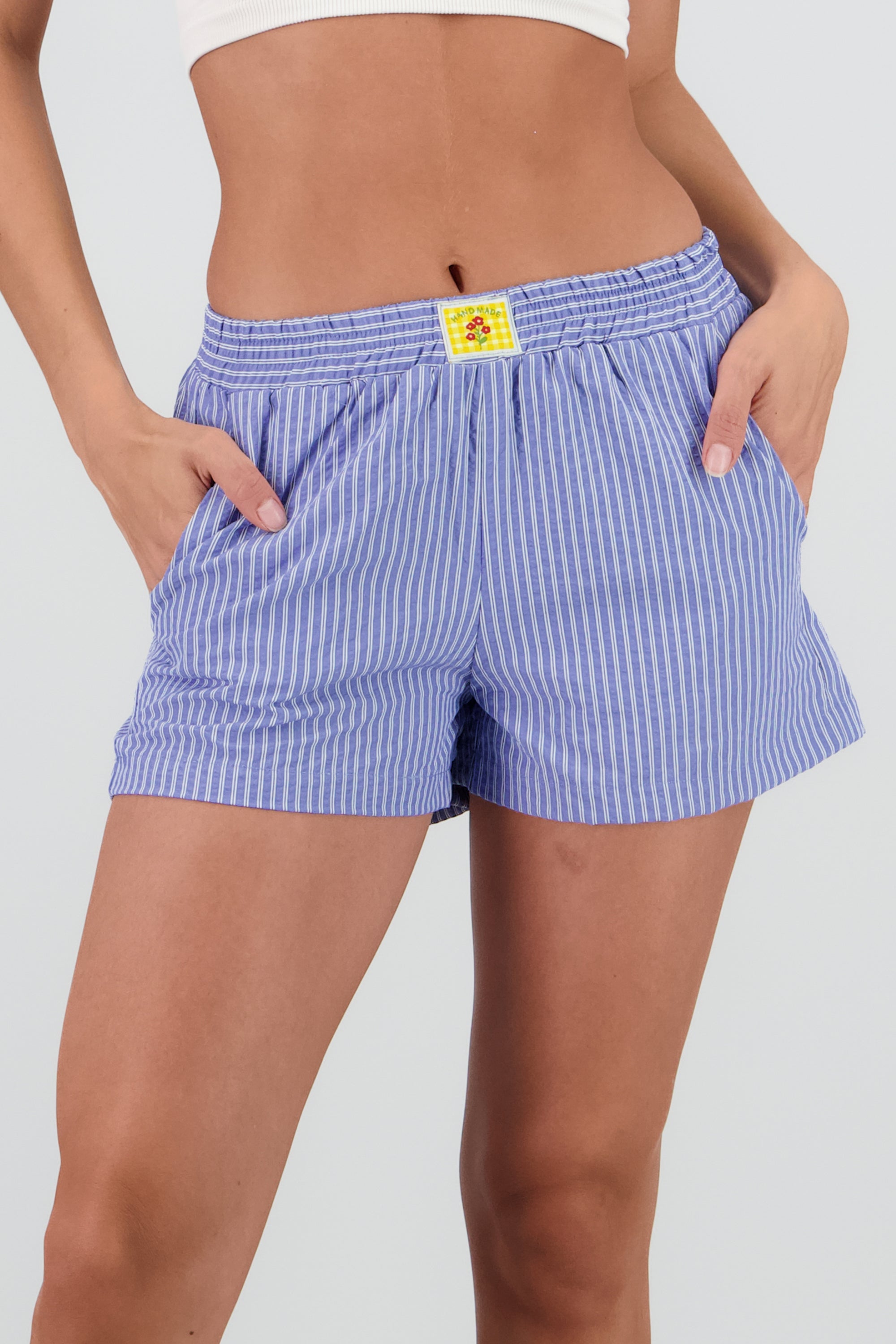 Shorts mini resorte detalle bolsas AZUL PASTEL