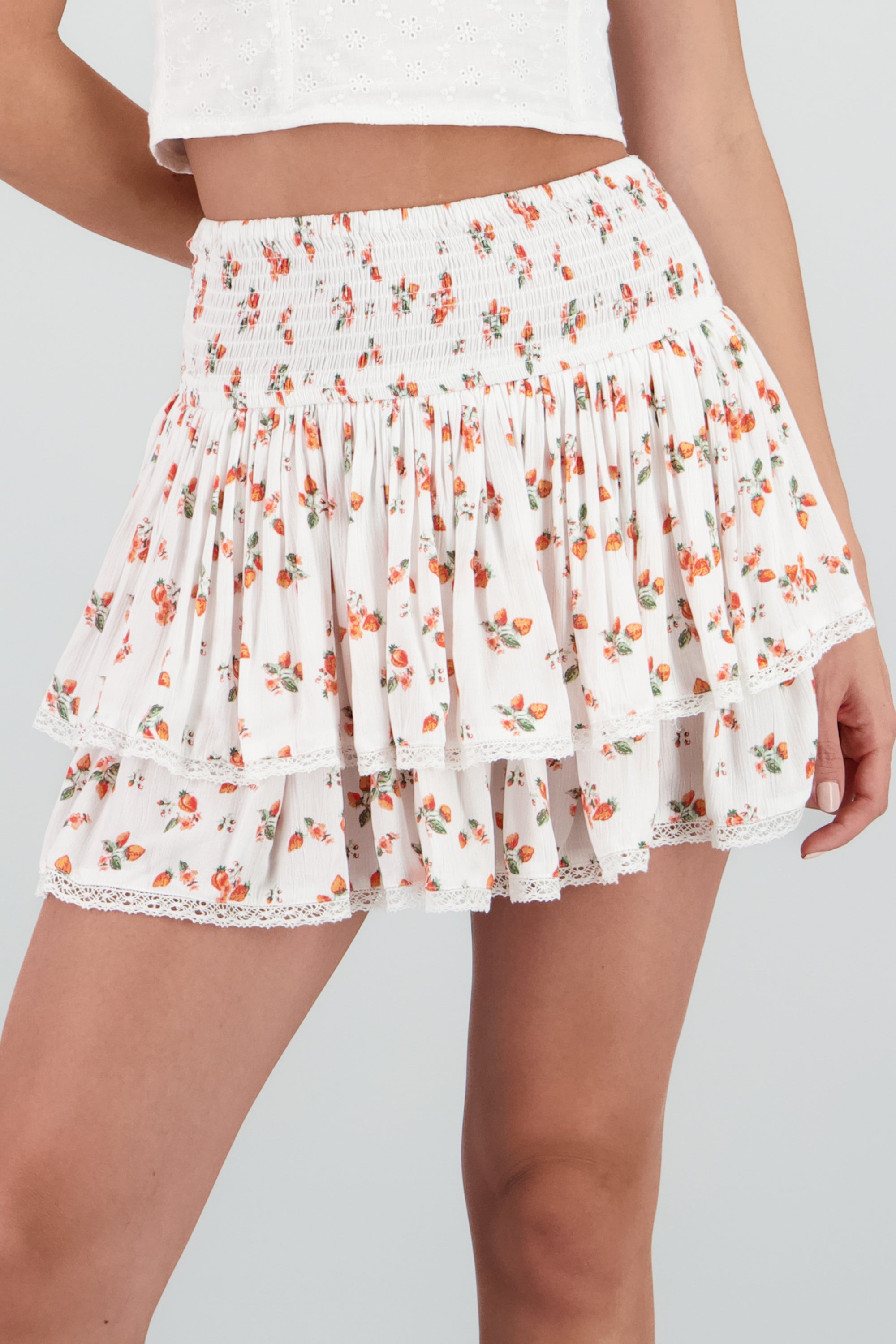 Falda mini capa olanes flores BLANCO COMBO