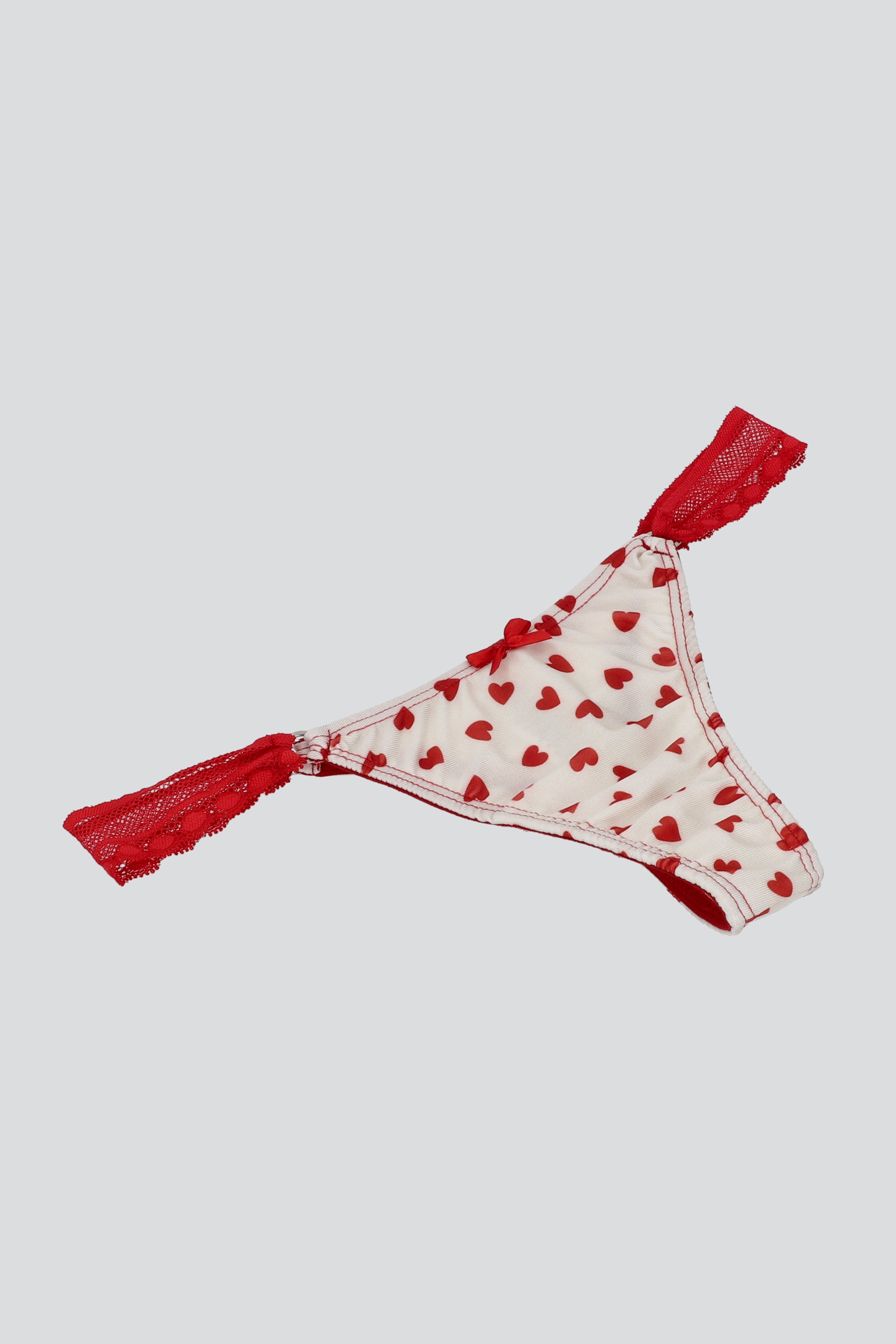 Tanga detalle lateral estampado formas HUESO