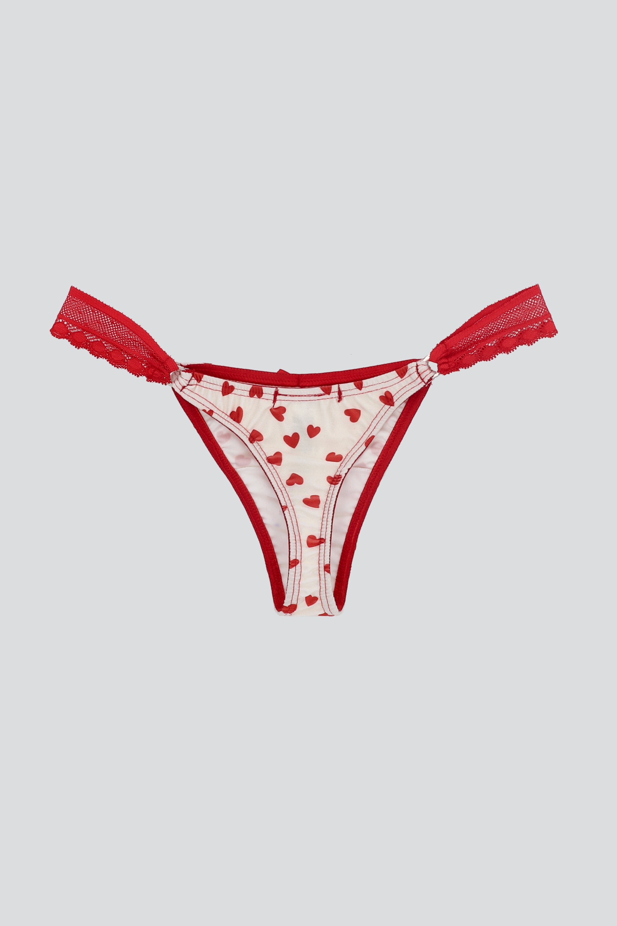 Tanga detalle lateral estampado formas HUESO