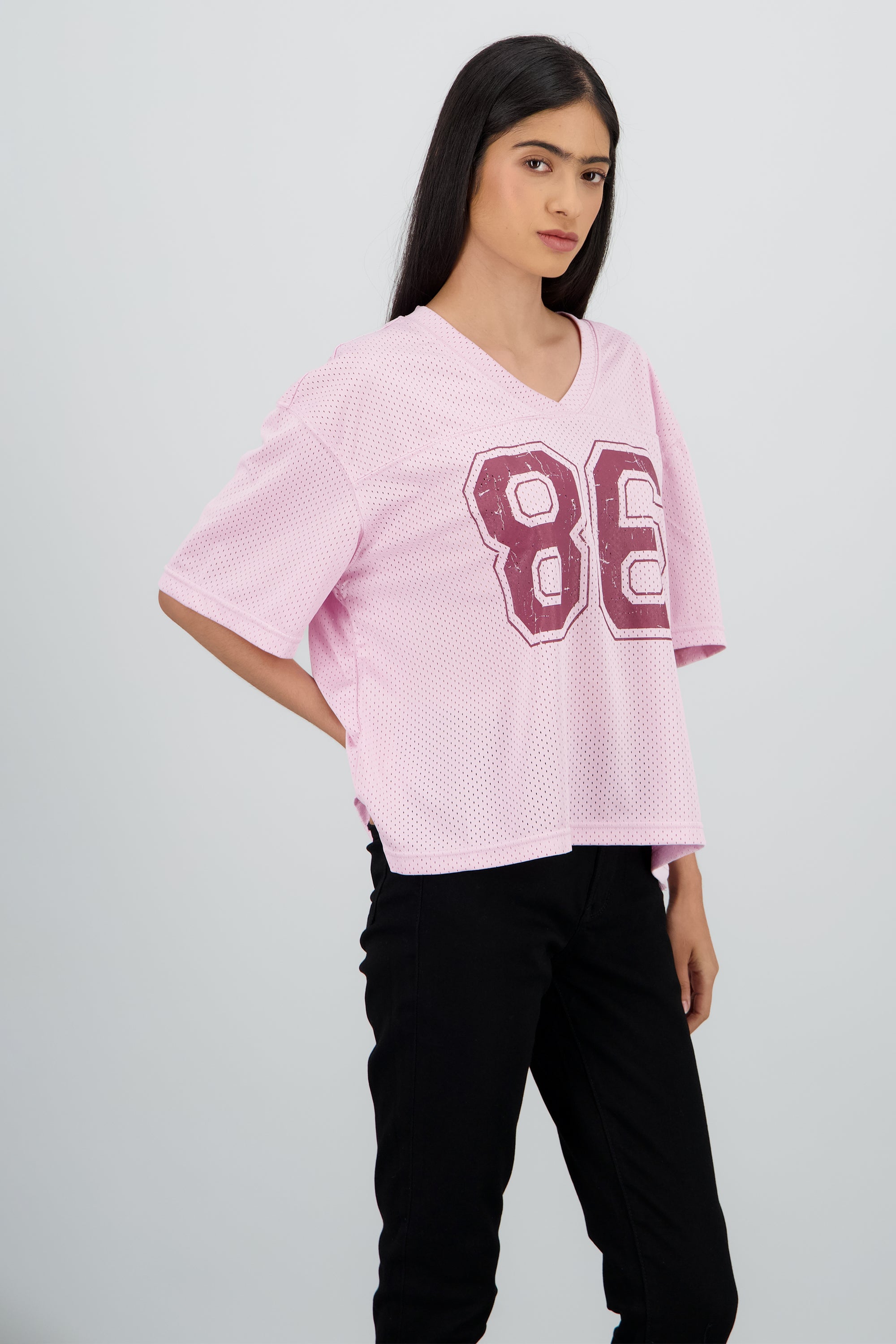 Playera tipo jersey con numero ROSA COMBO
