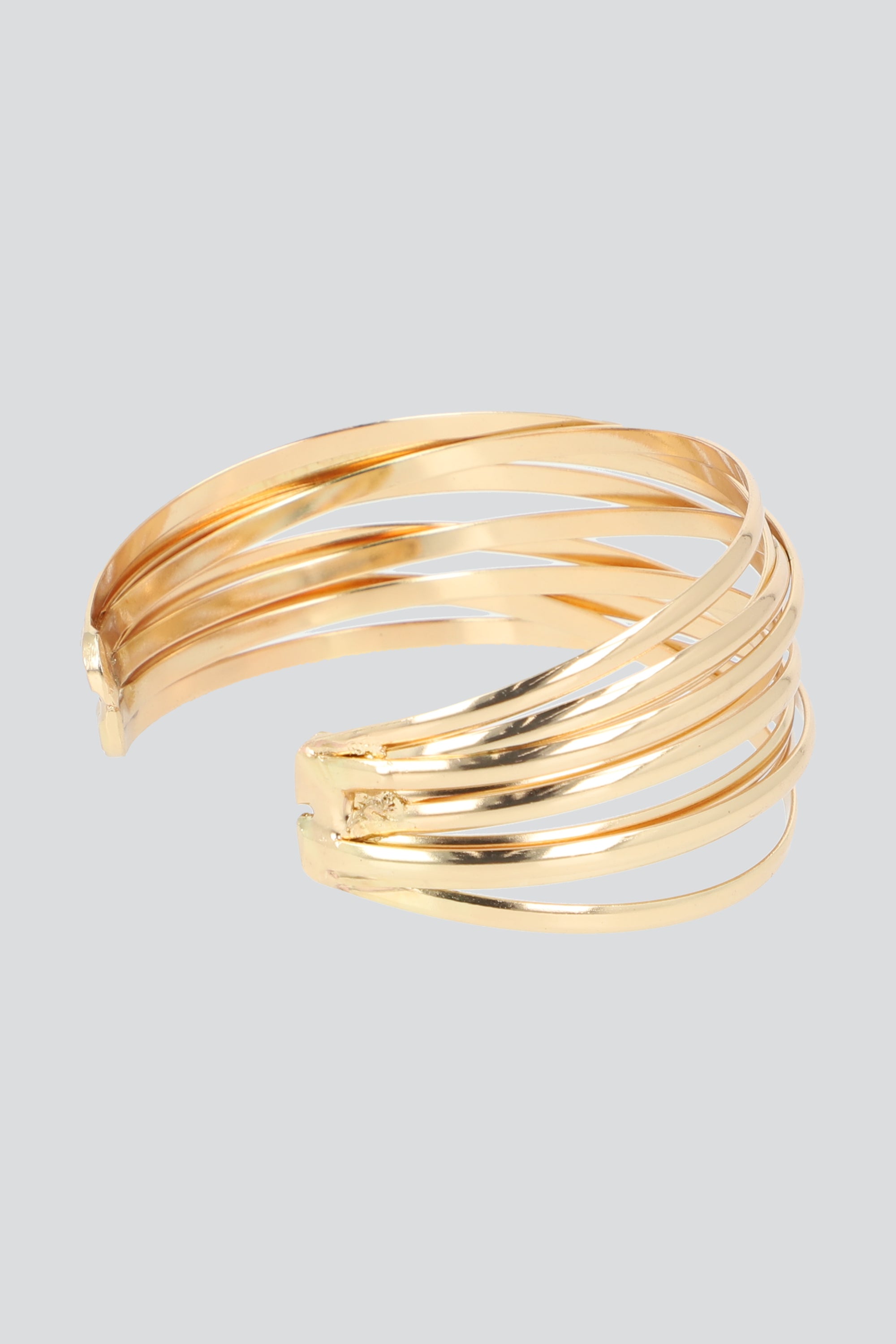 Cuff multilineas metal ORO