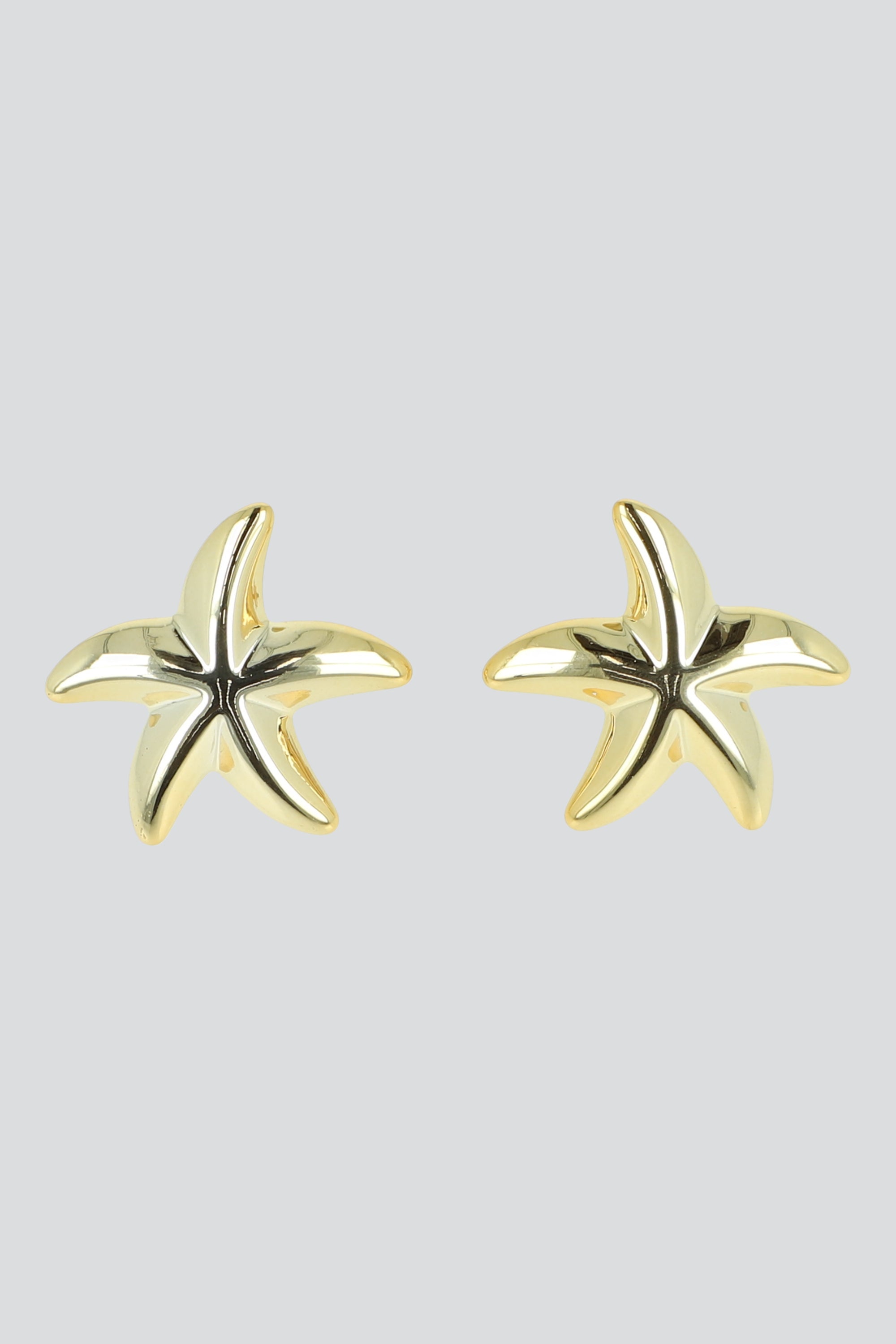 Aretes estrellas de mar metal ORO