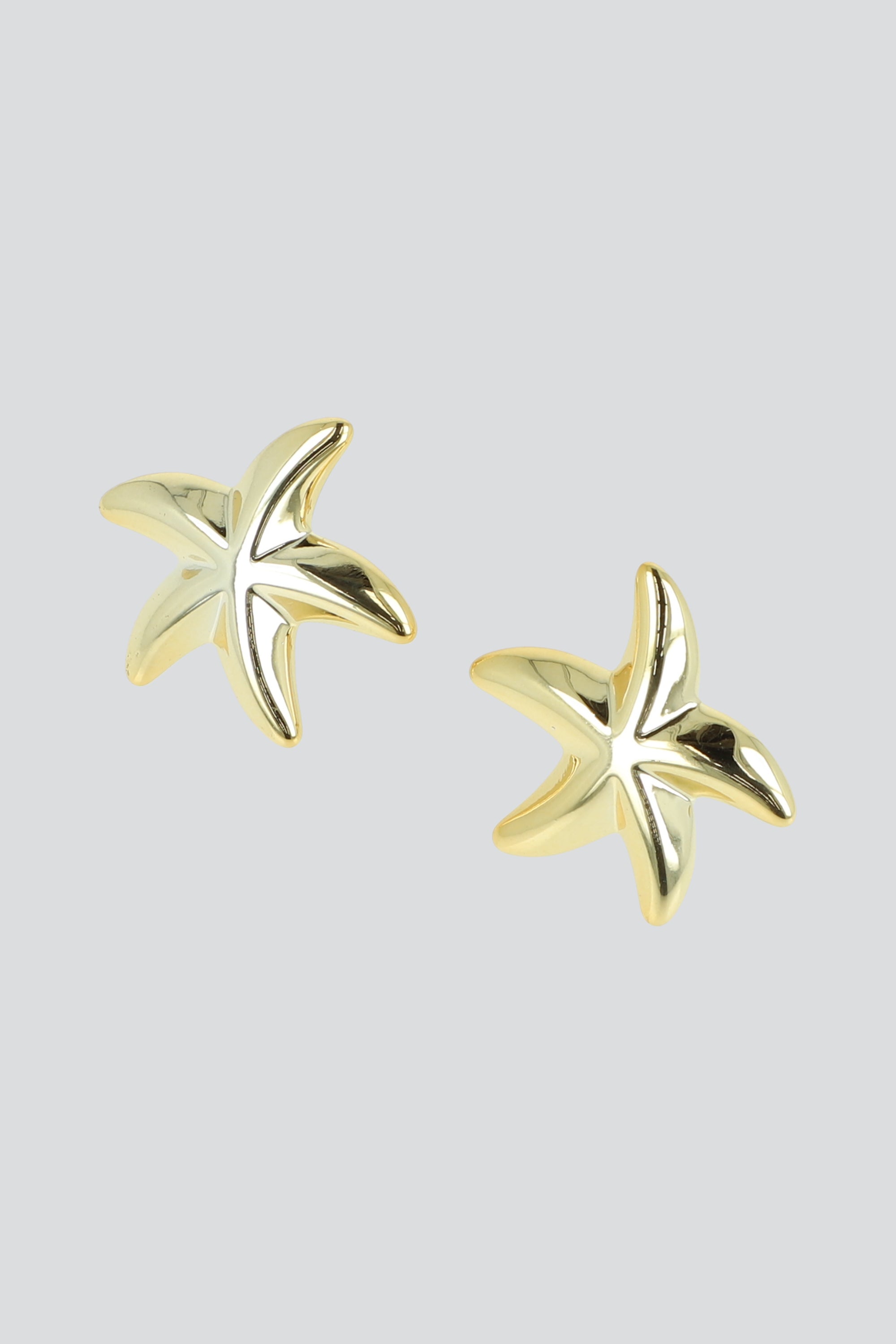 Aretes estrellas de mar metal ORO
