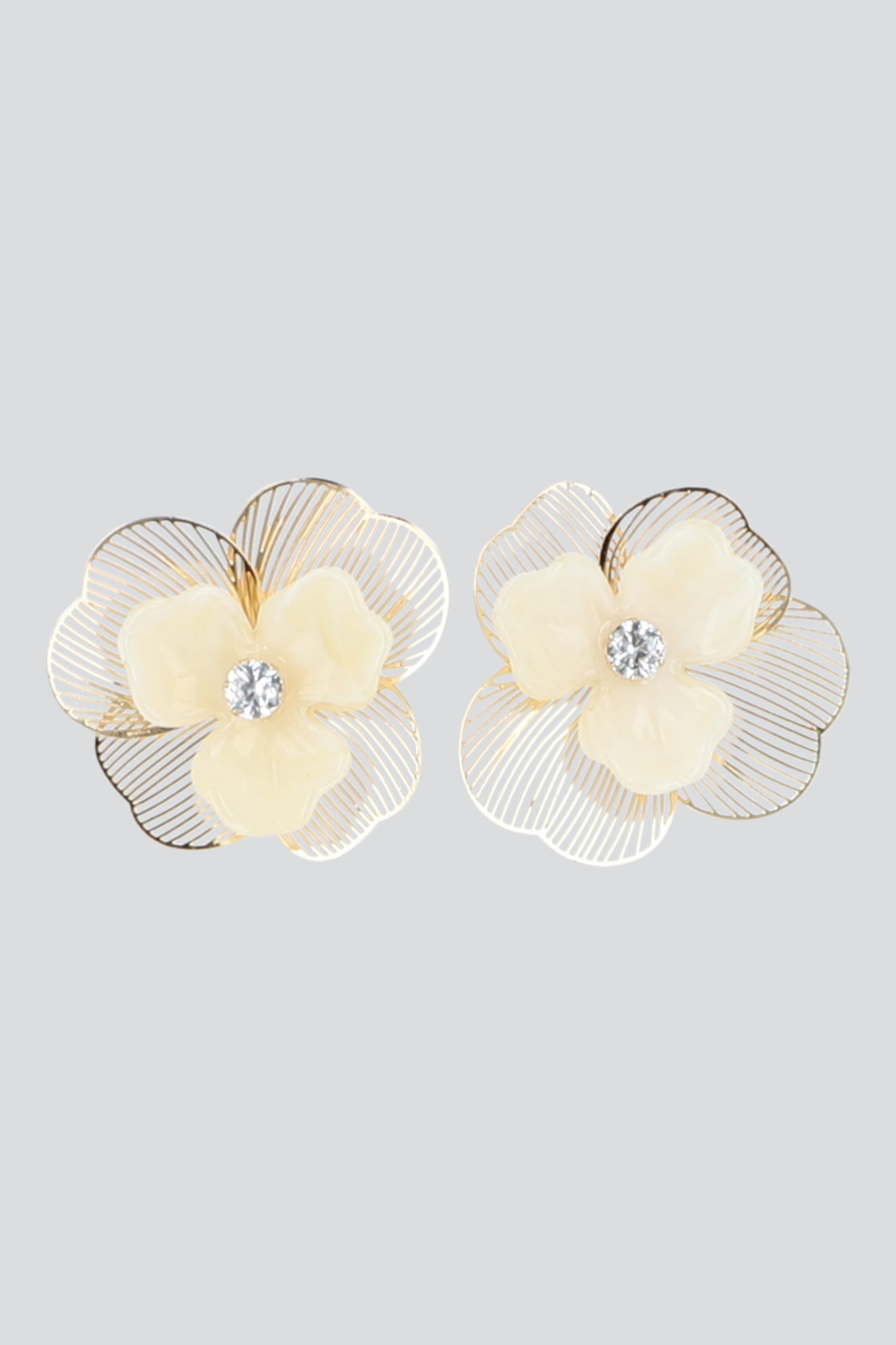 Aretes flor metal calada HUESO