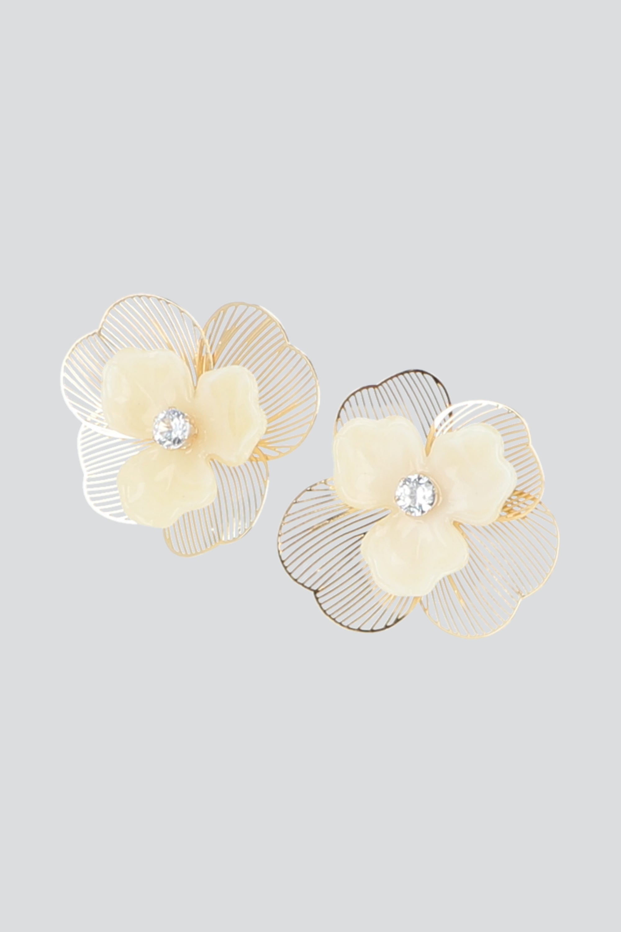 Aretes flor metal calada HUESO