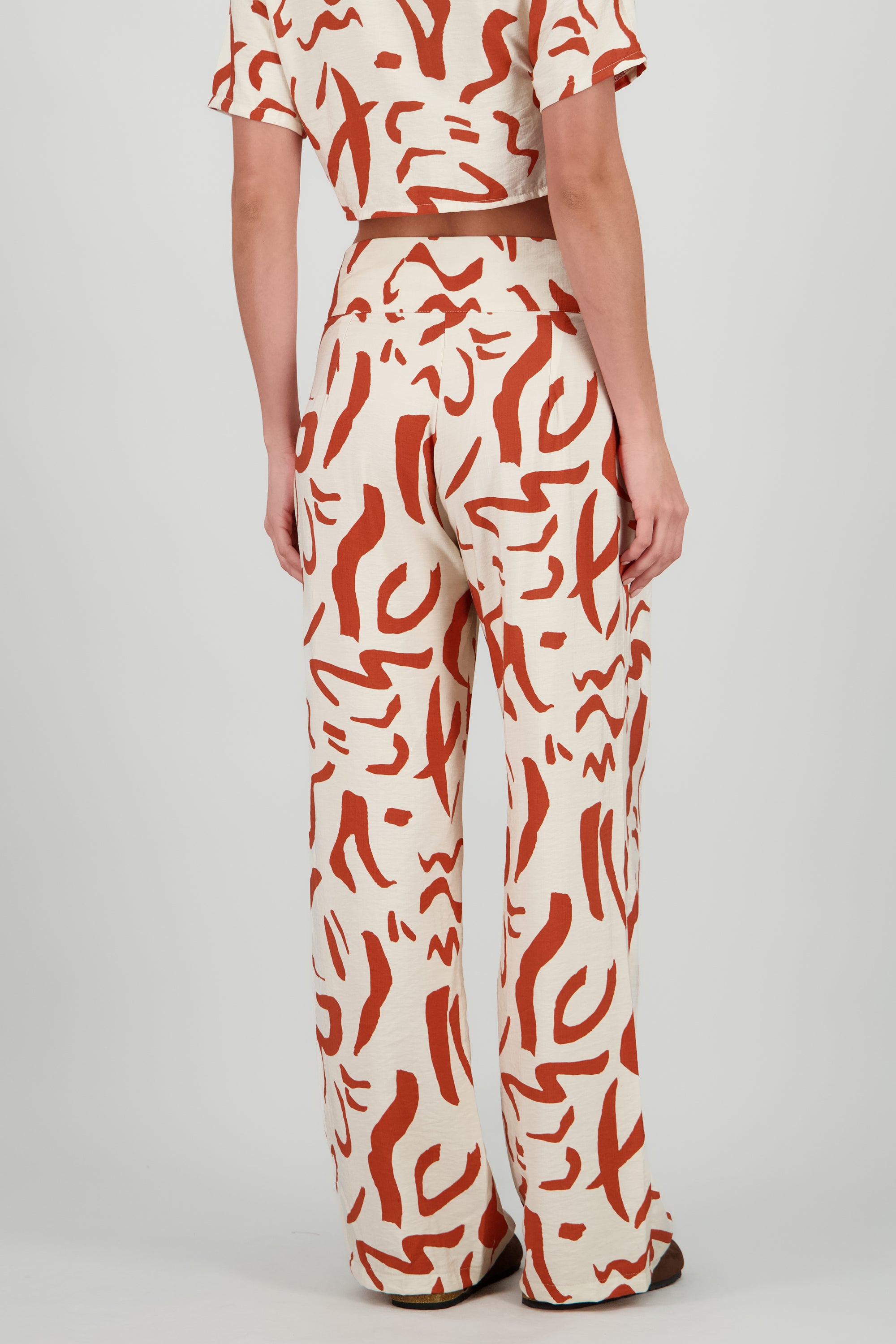 Pantalon pretina ancha estampado geometrico NARANJA COMBO