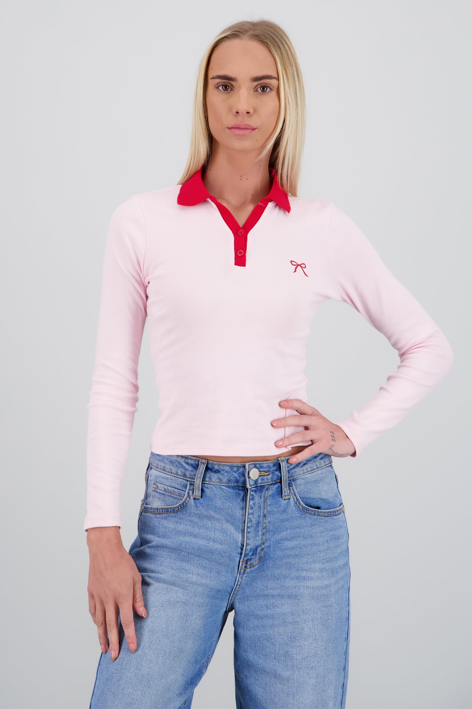 Top cuello polo bordado moño ROSA COMBO