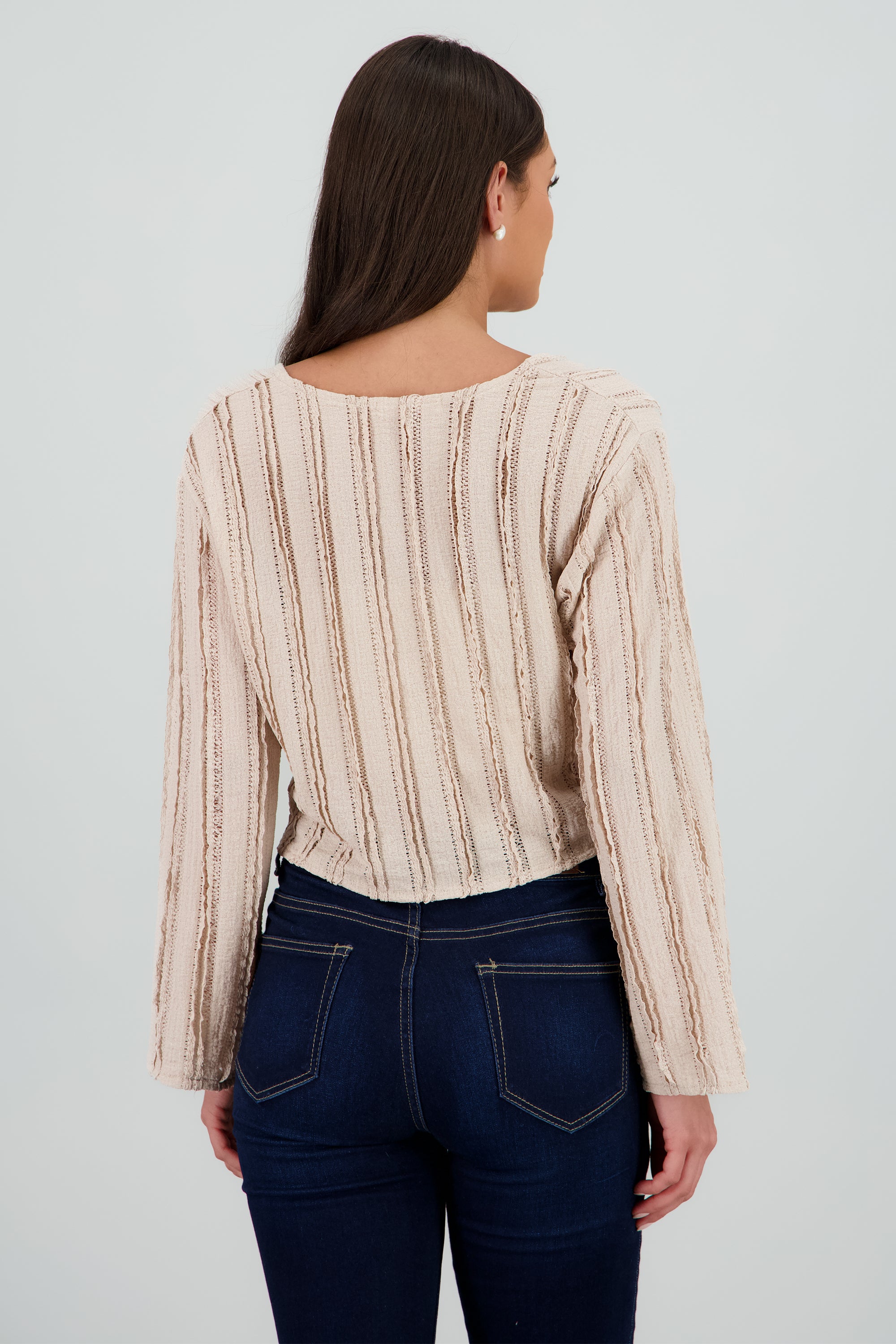 Blusa con textura detalle amarre ARENA
