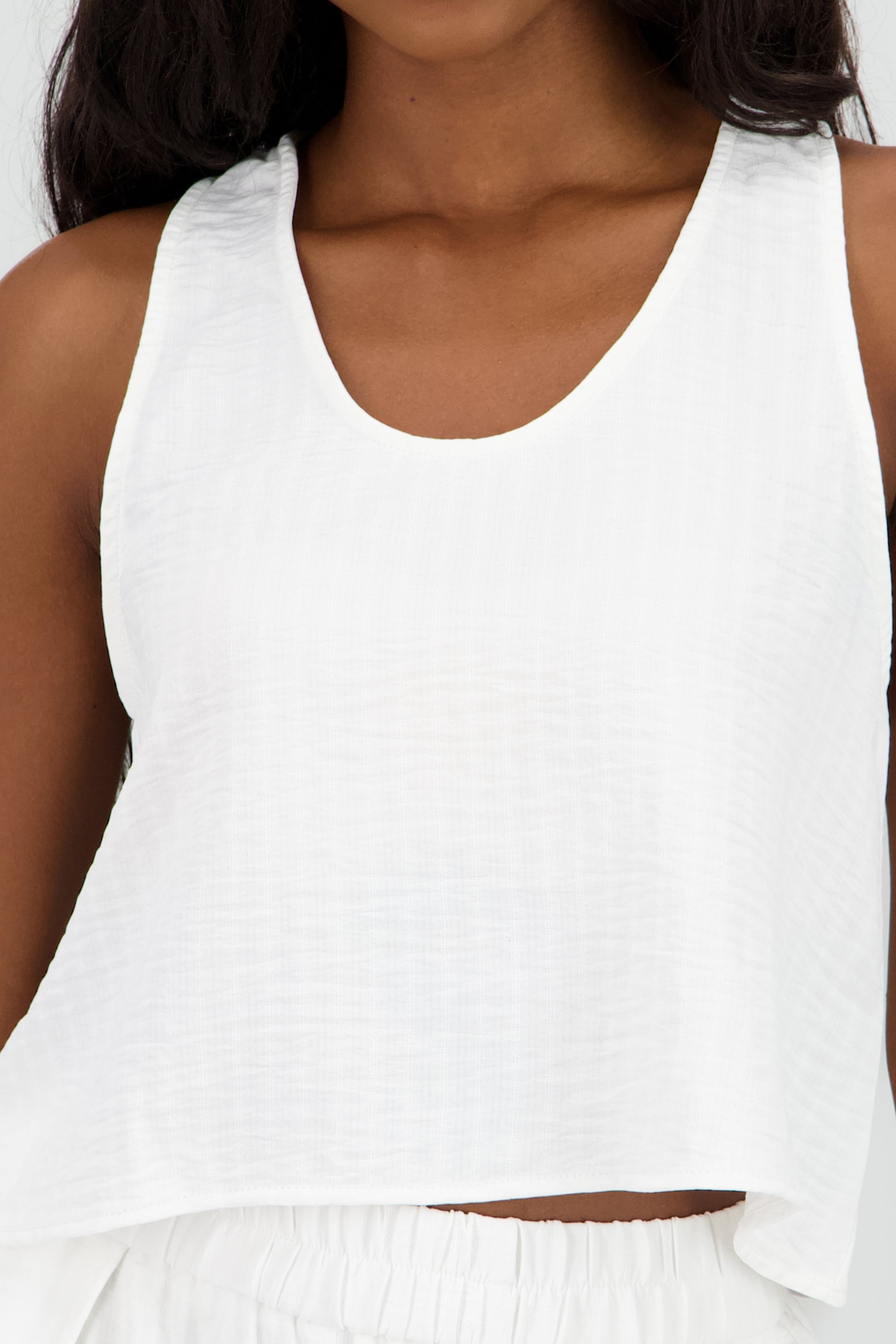 Blusa fluida textura sin manga BLANCO