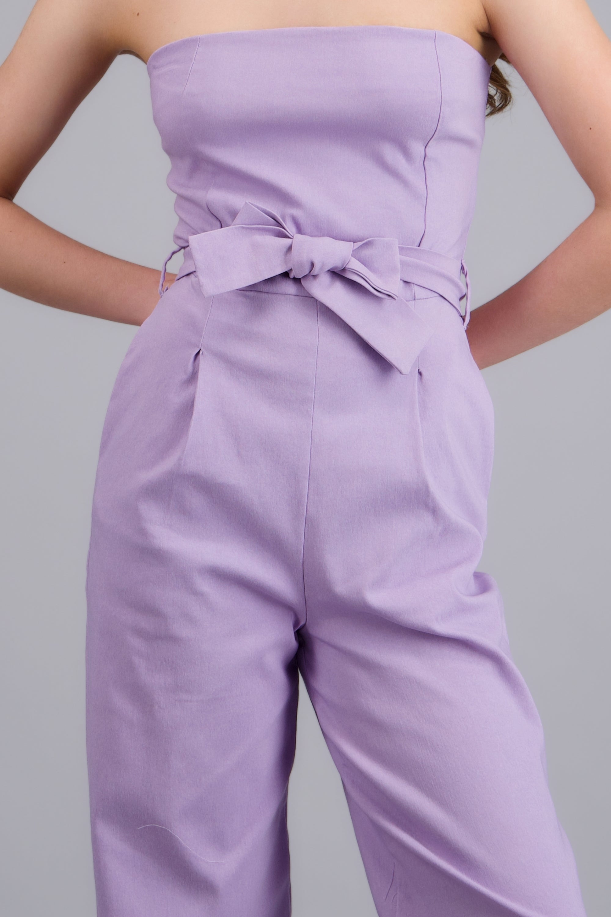 JUMPSUIT STRAPLESS DET CINTURON LILA