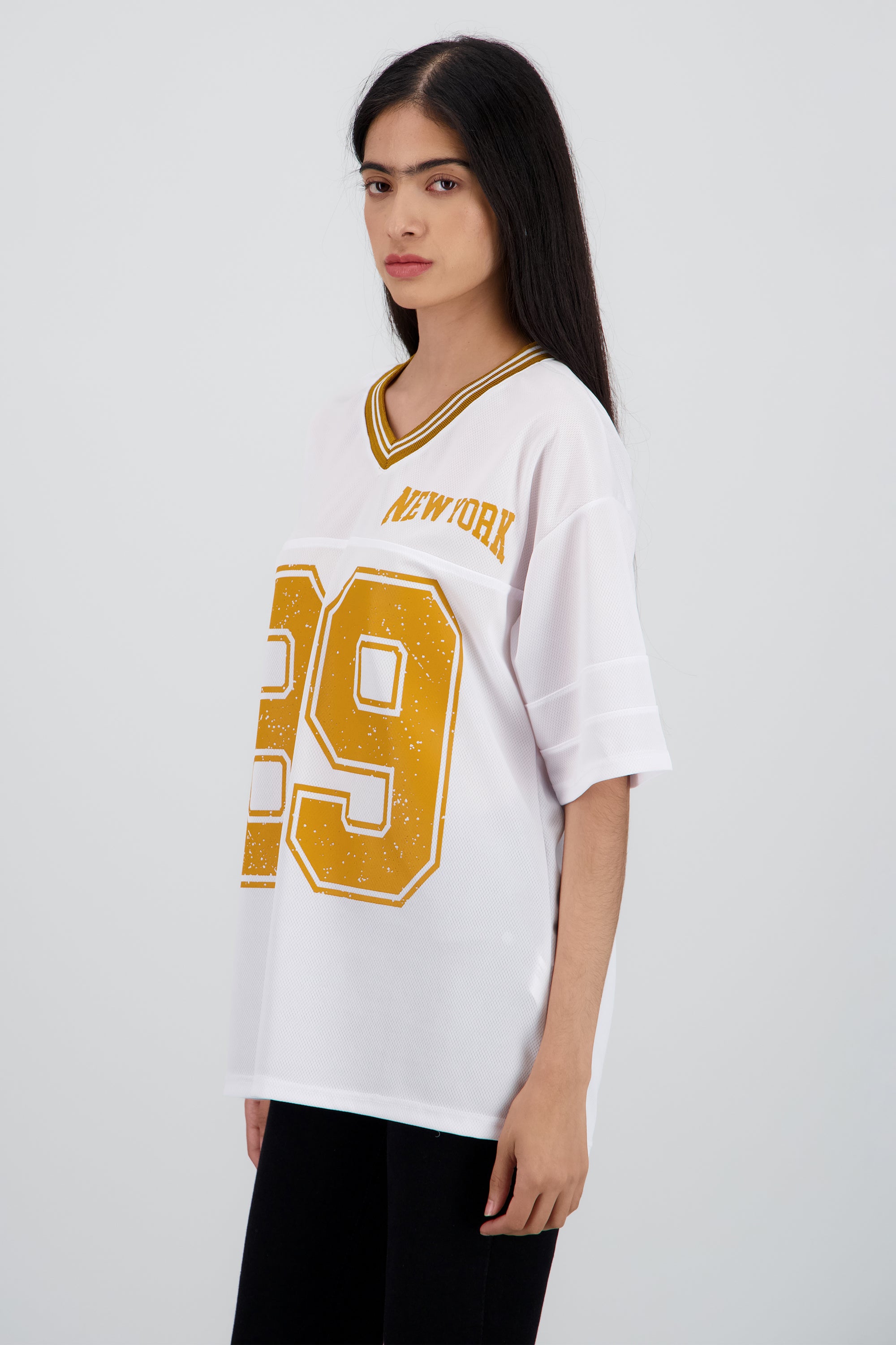 Playera oversize estampado numero MOSTAZA
