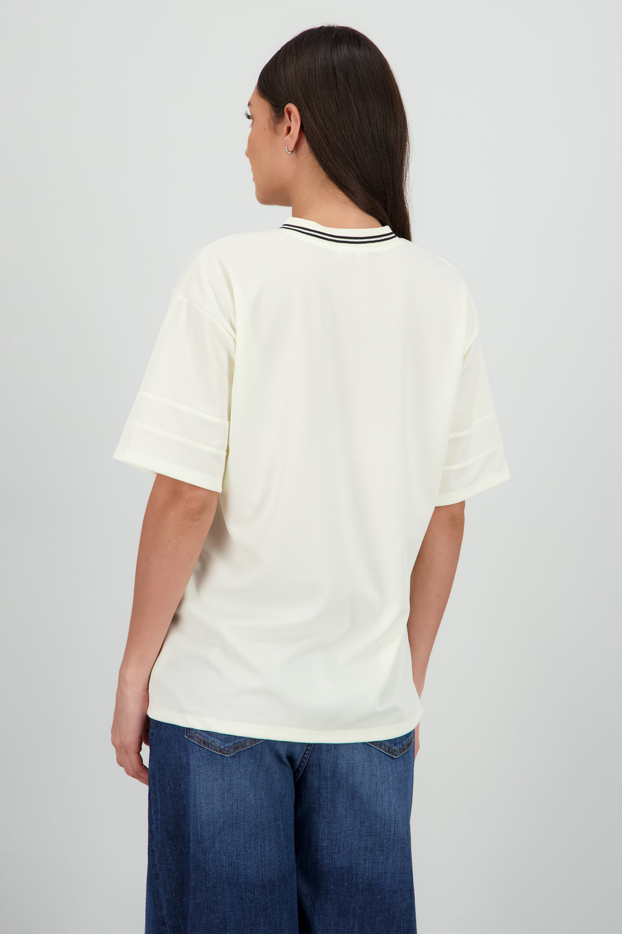 Playera oversize estampado numero AMARILLO PASTEL