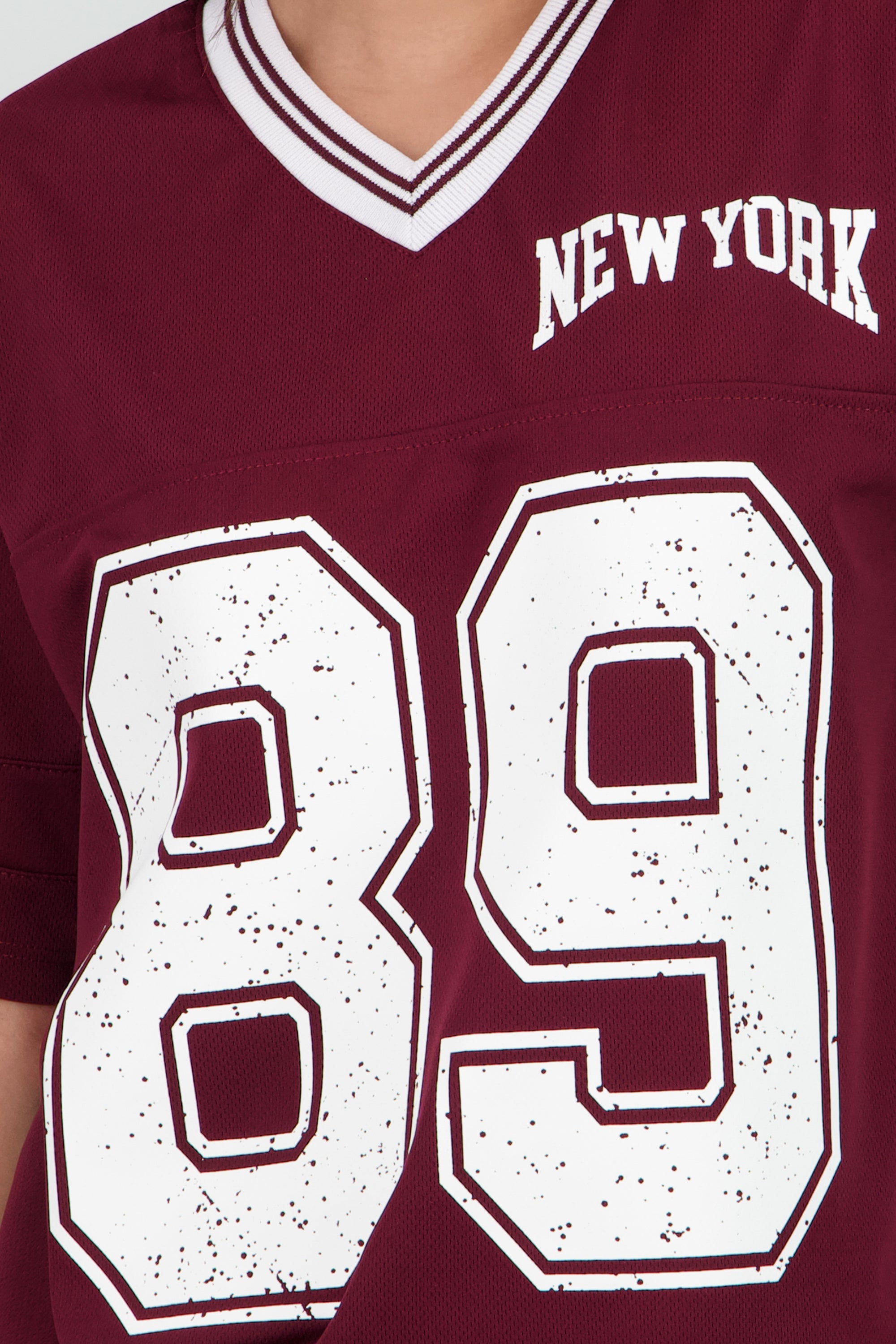 Playera oversize estampado numero CIRUELA
