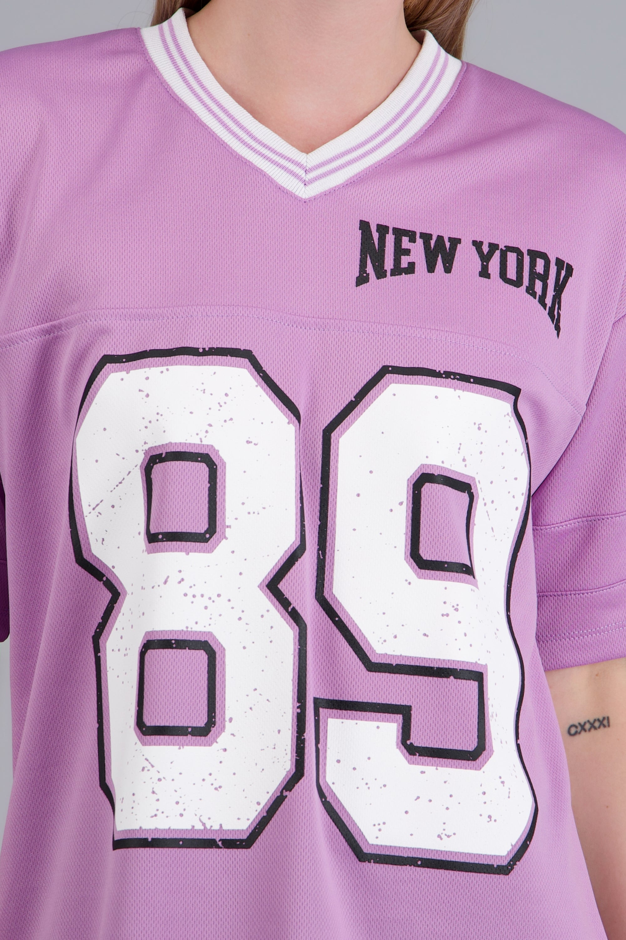 Playera oversized estampado numero LILA