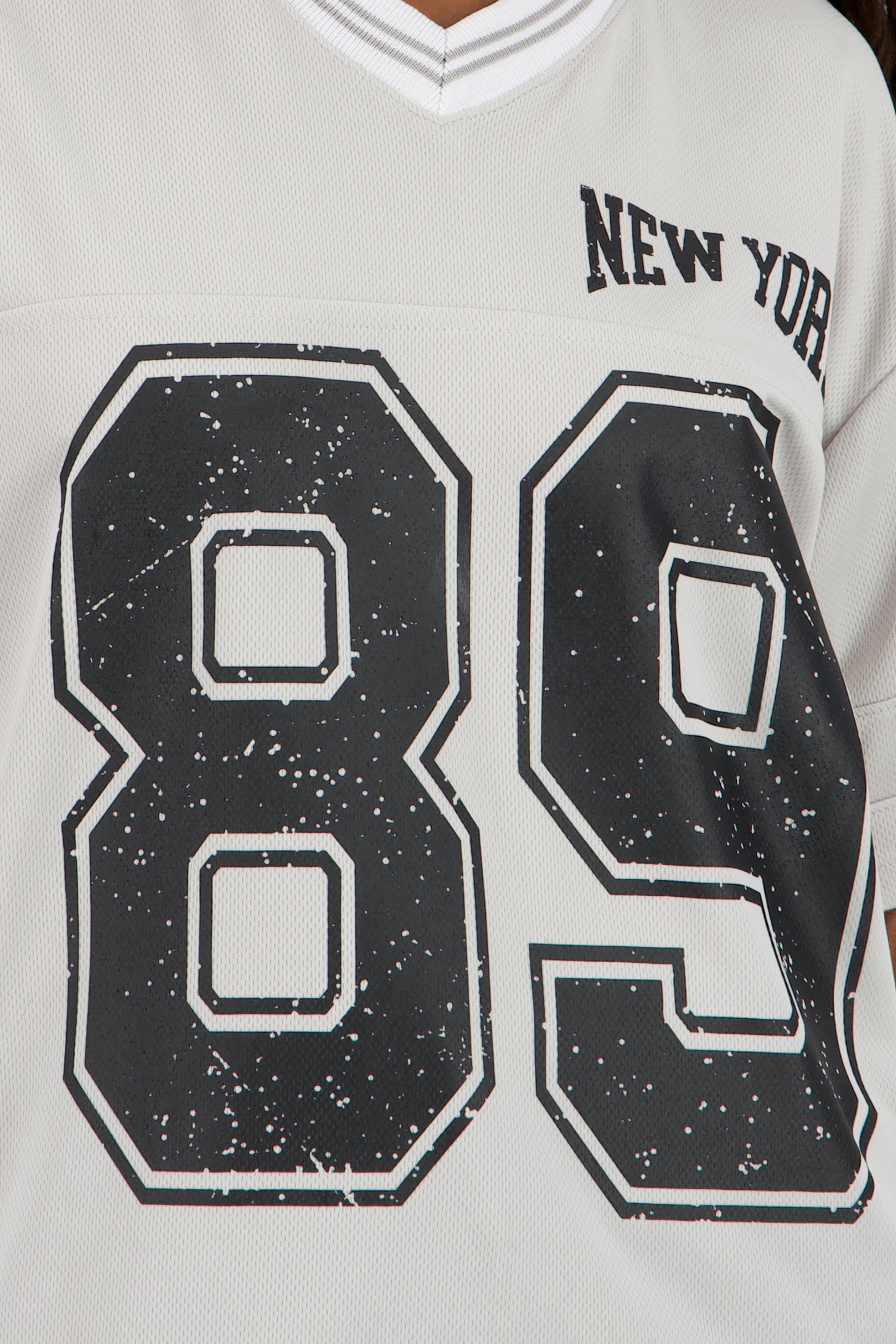 Playera oversize estampado numero GRIS CLARO
