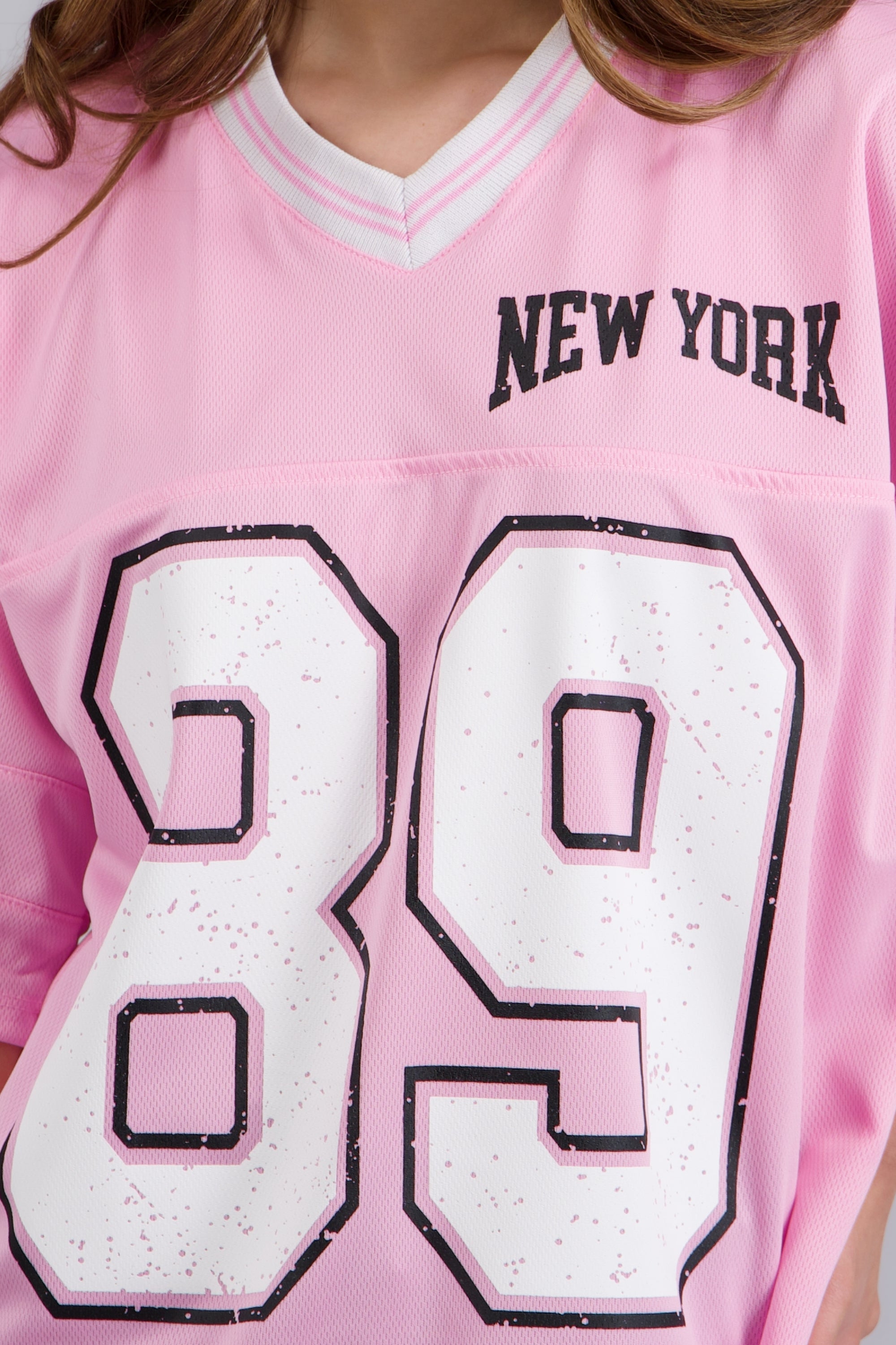 Playera oversized estampado numero ROSA PASTEL