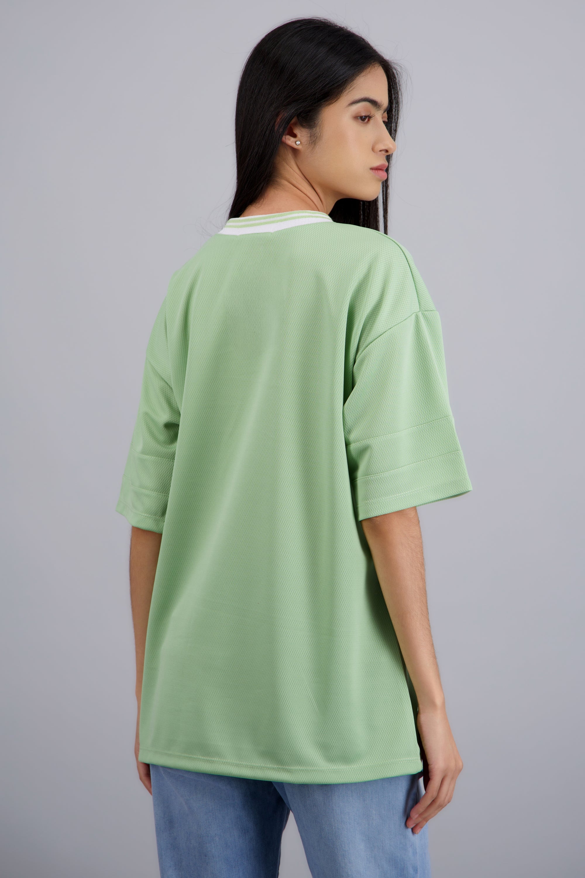 Playera oversized estampado numero VERDE CLARO