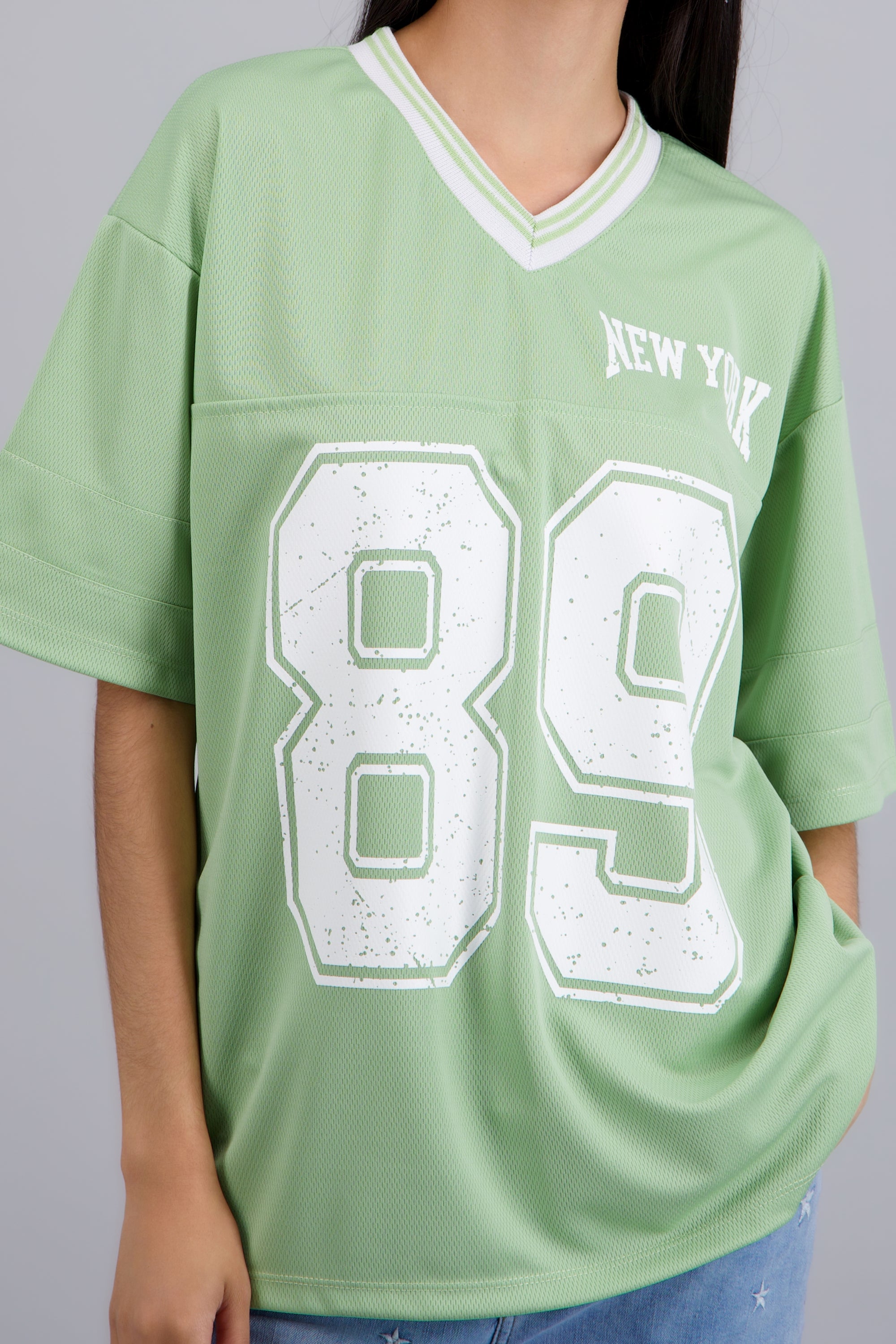Playera oversized estampado numero VERDE CLARO