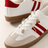 Tenis dos lineas punta durazno con charms