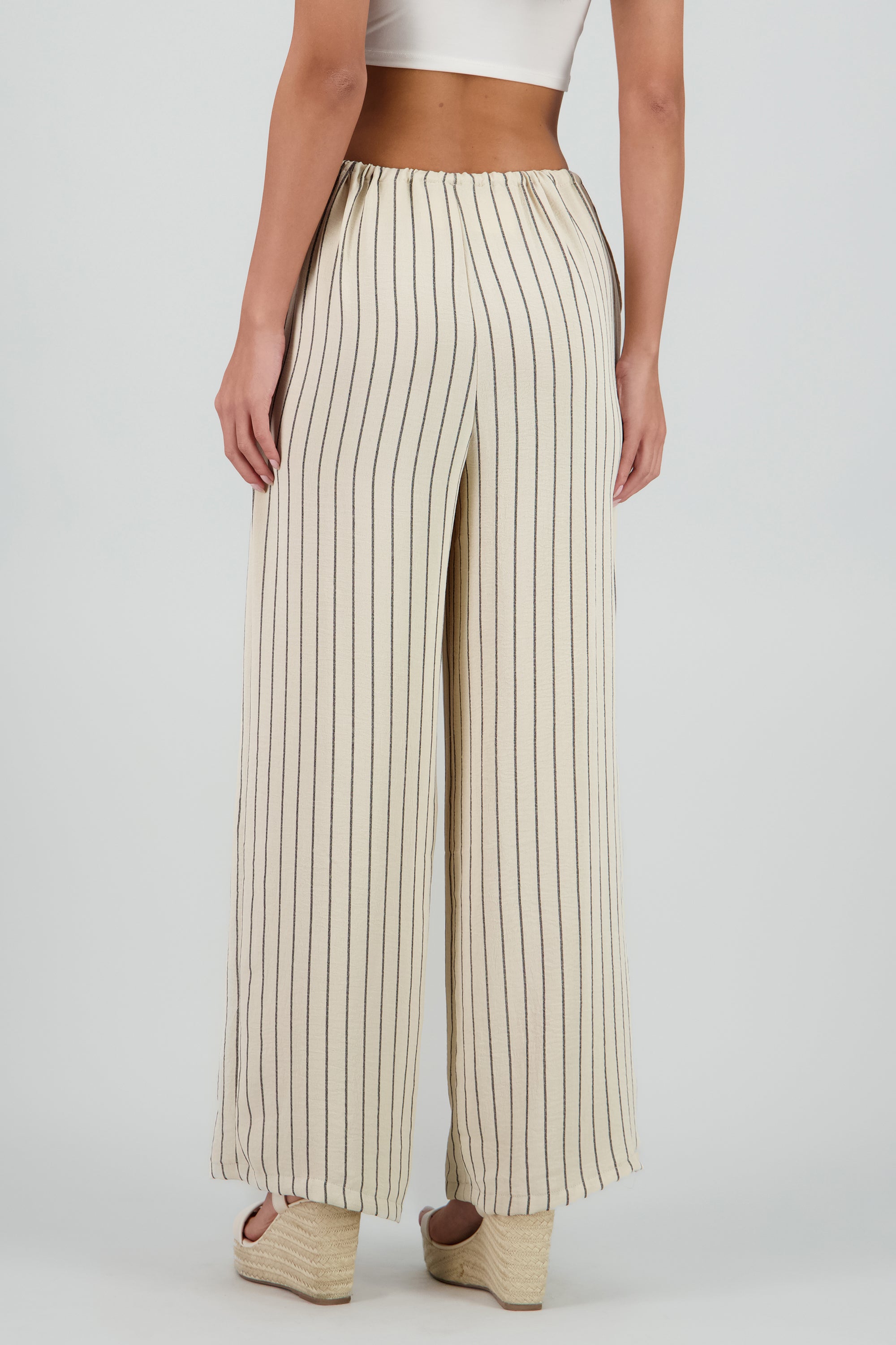 Pantalon fluido con jareta rayas HUESO COMBO