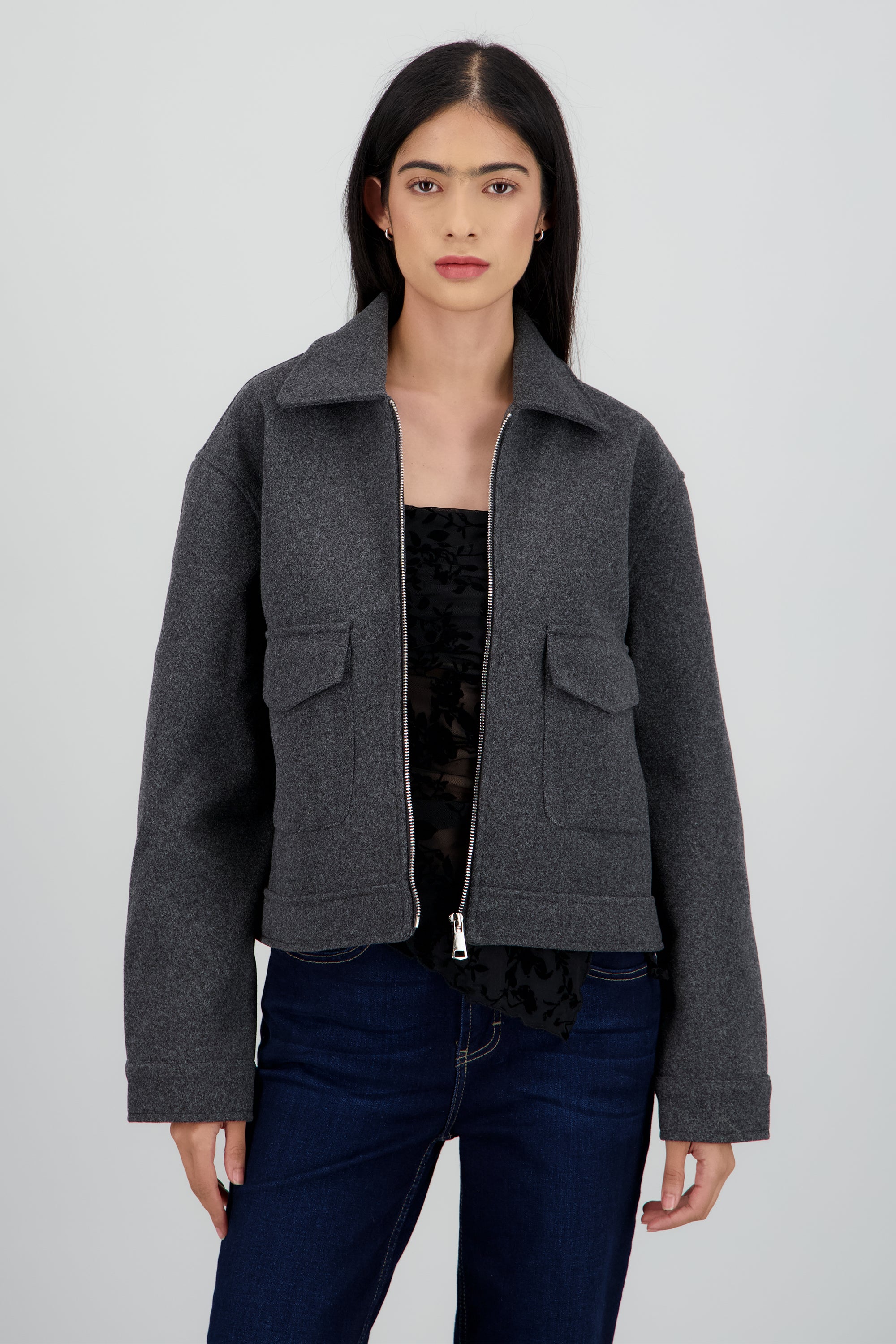 Chamarra polo con bolsas de paño GRIS