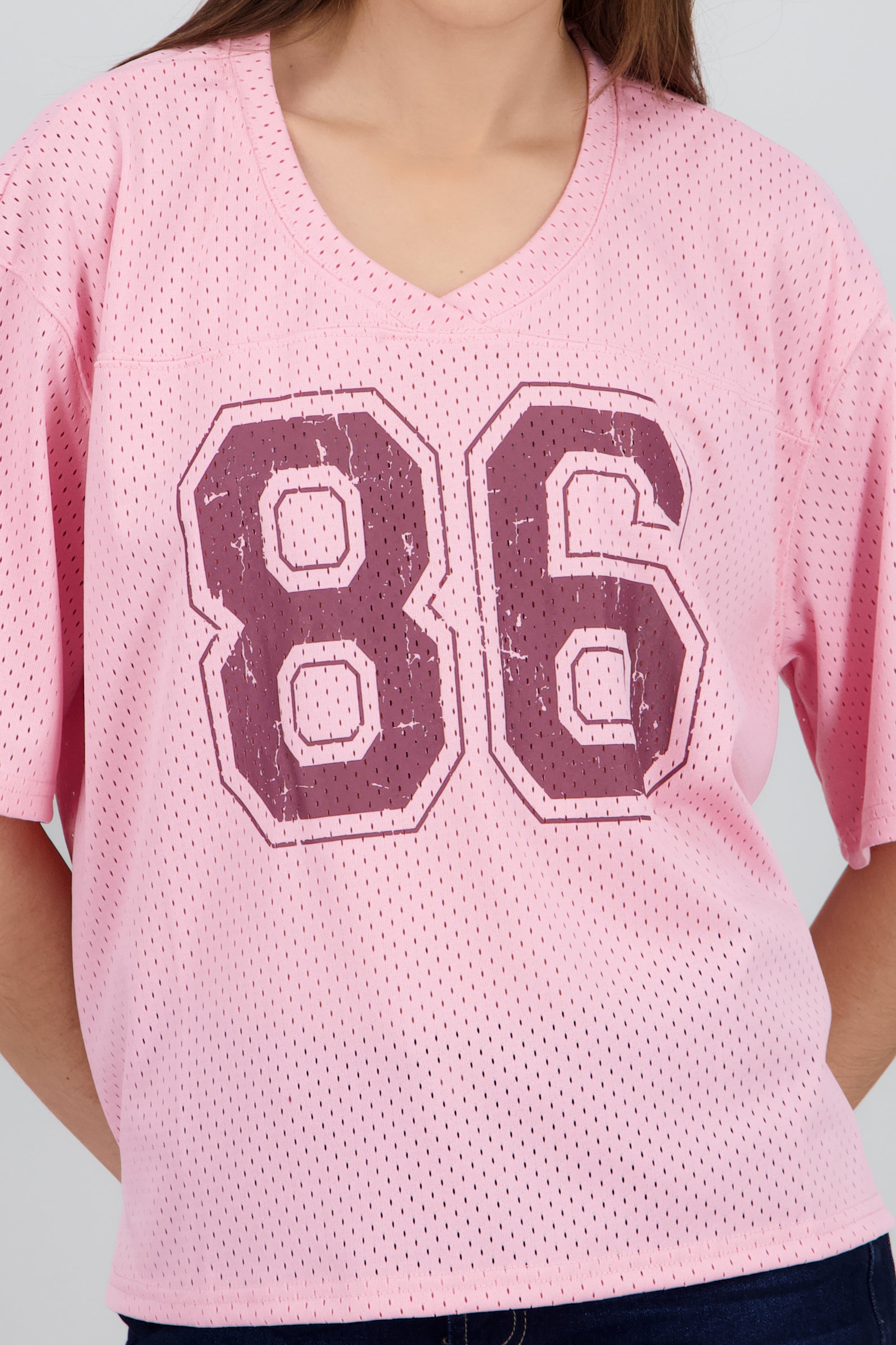 Playera tipo jersey con numero MALVA