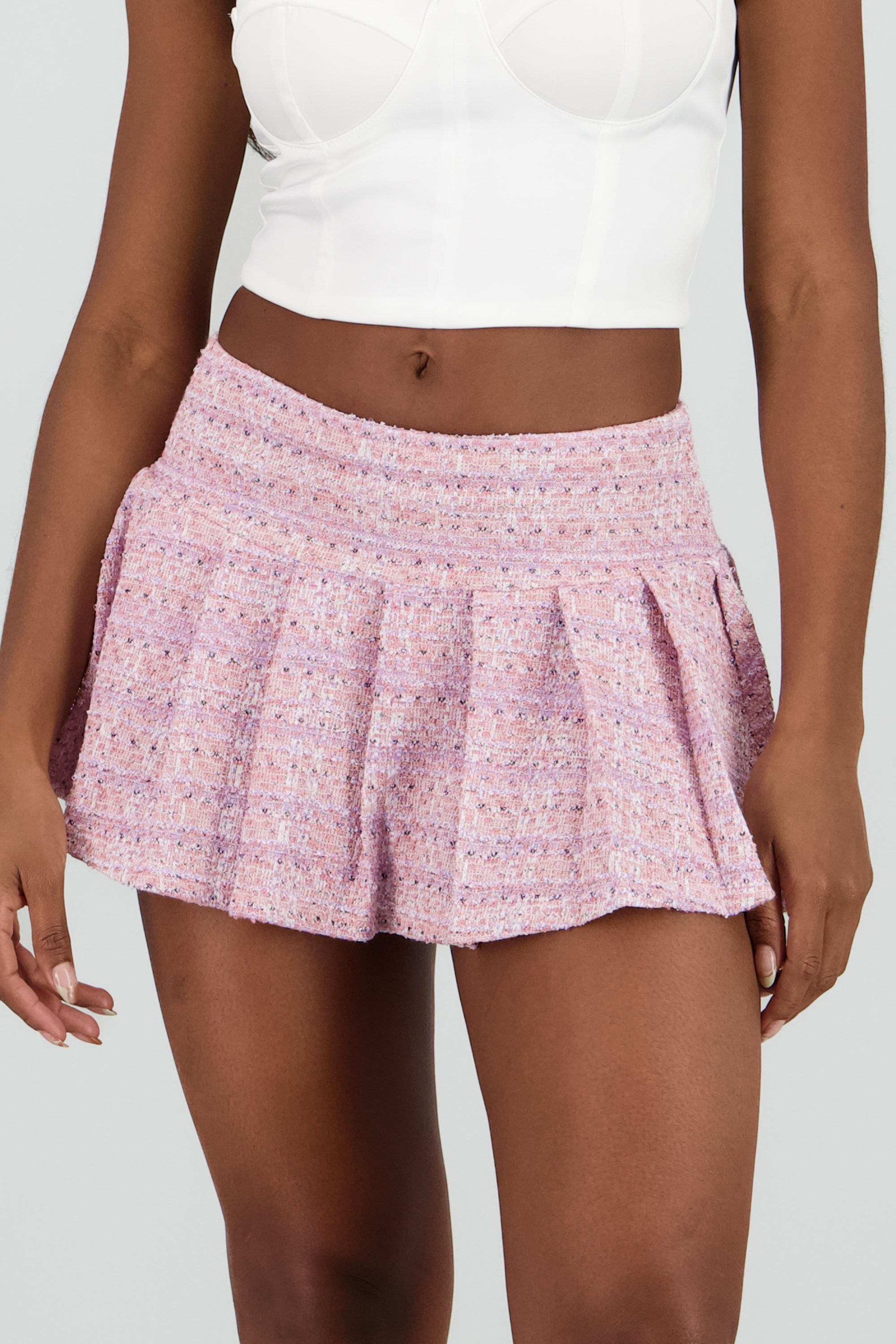 Falda mini plisada con textura ROSA COMBO