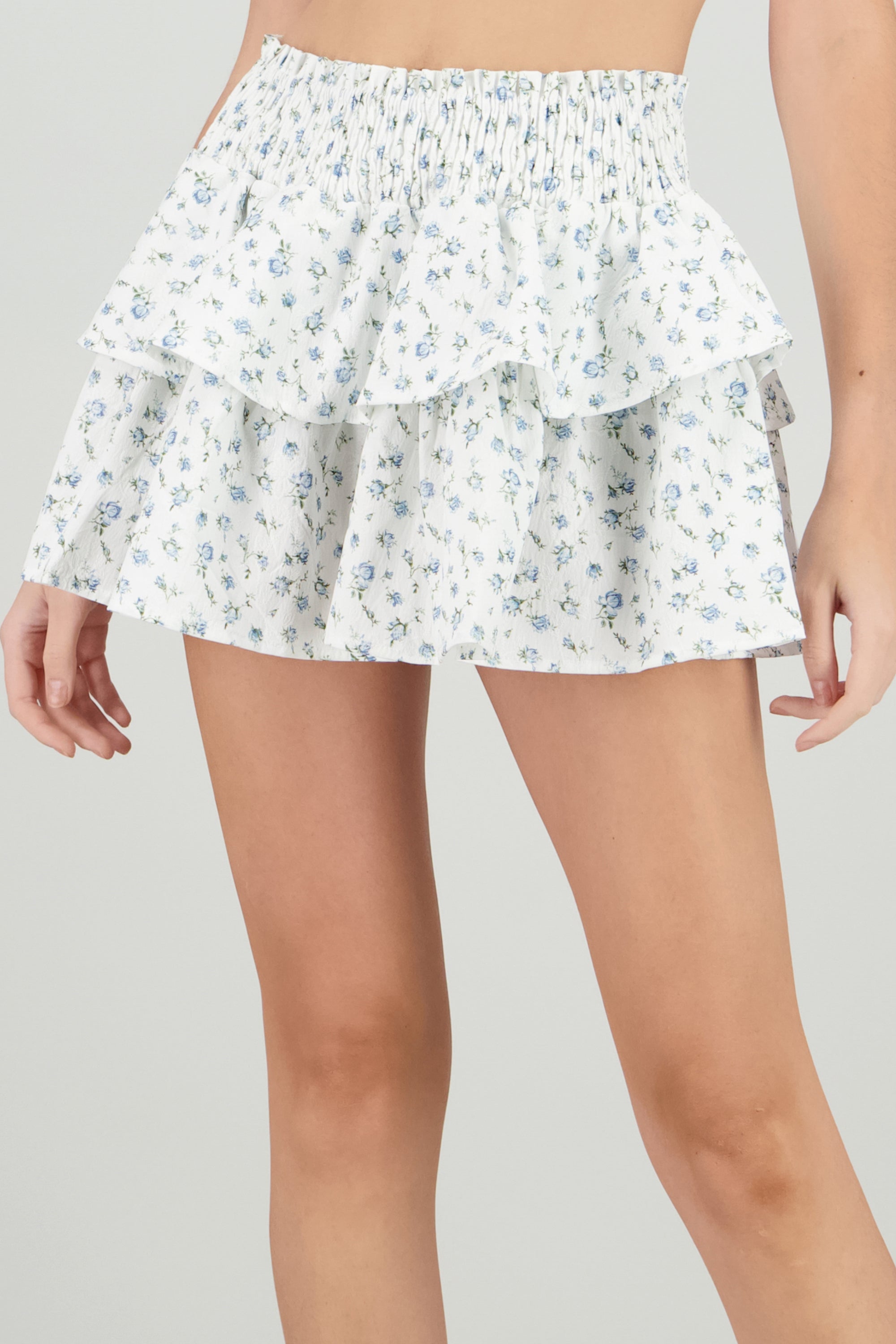 Falda mini estampada flores olanes AZUL COMBO