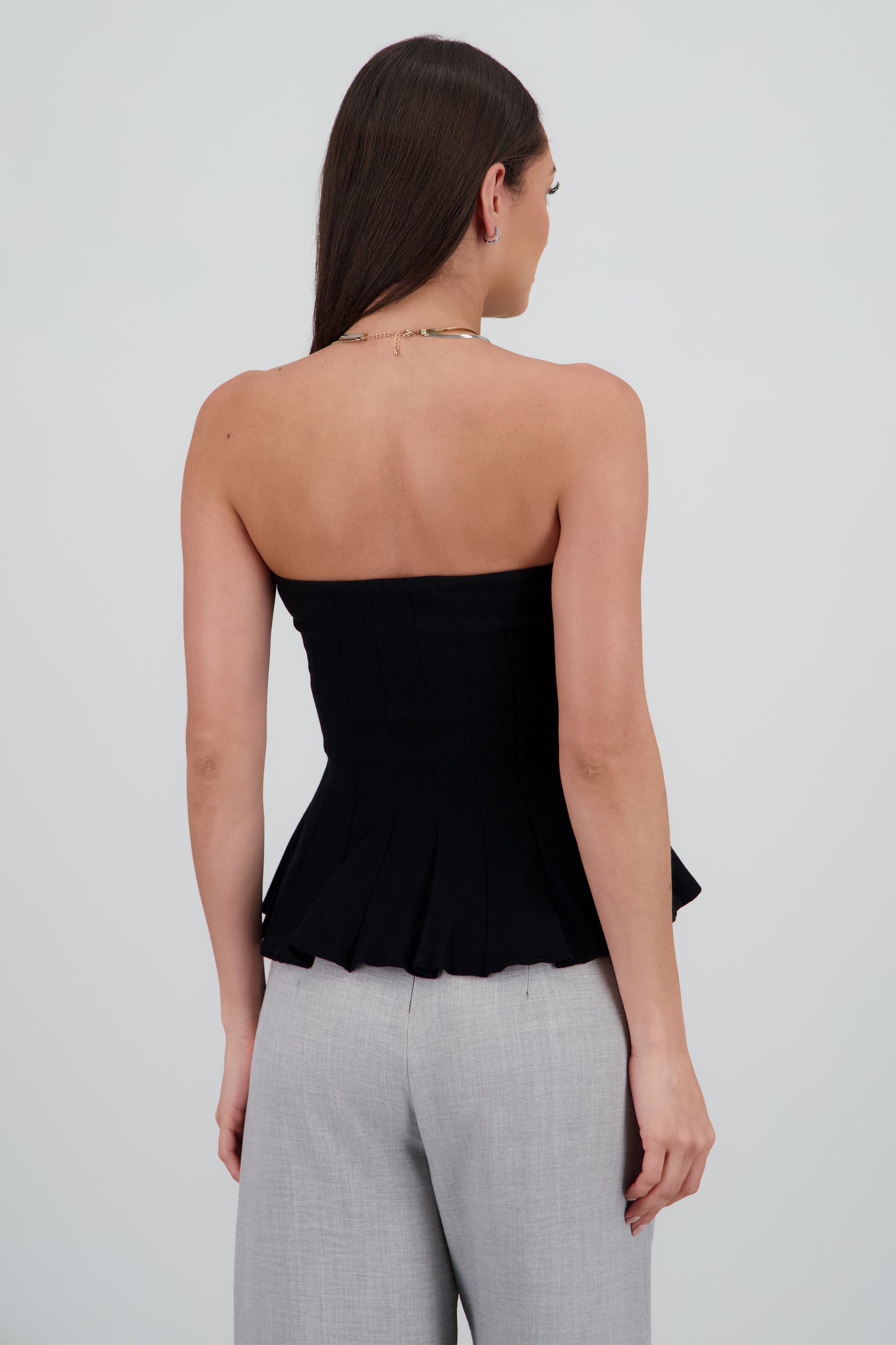 Top strapless peplum NEGRO