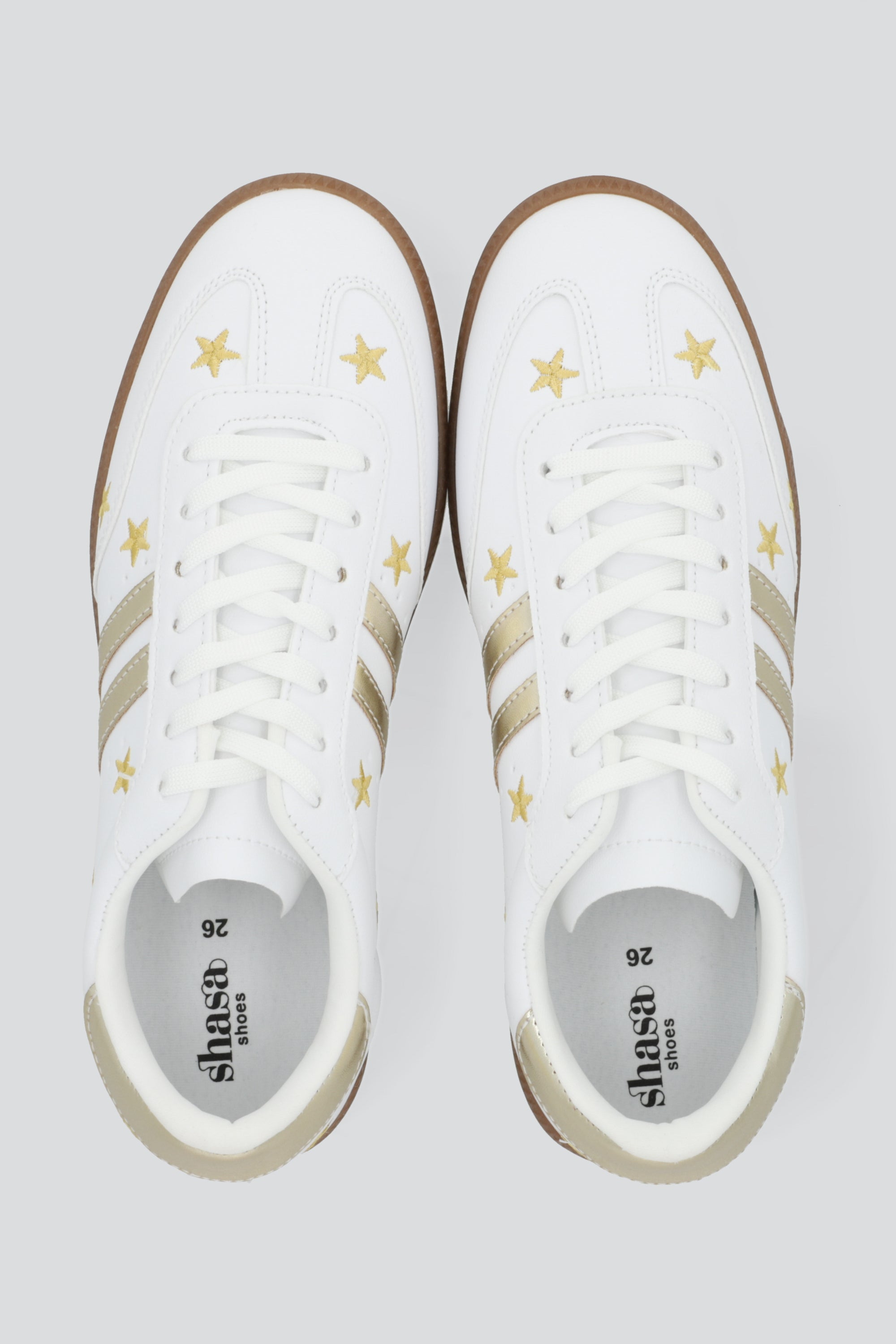 Tenis dos lineas estrellas ORO