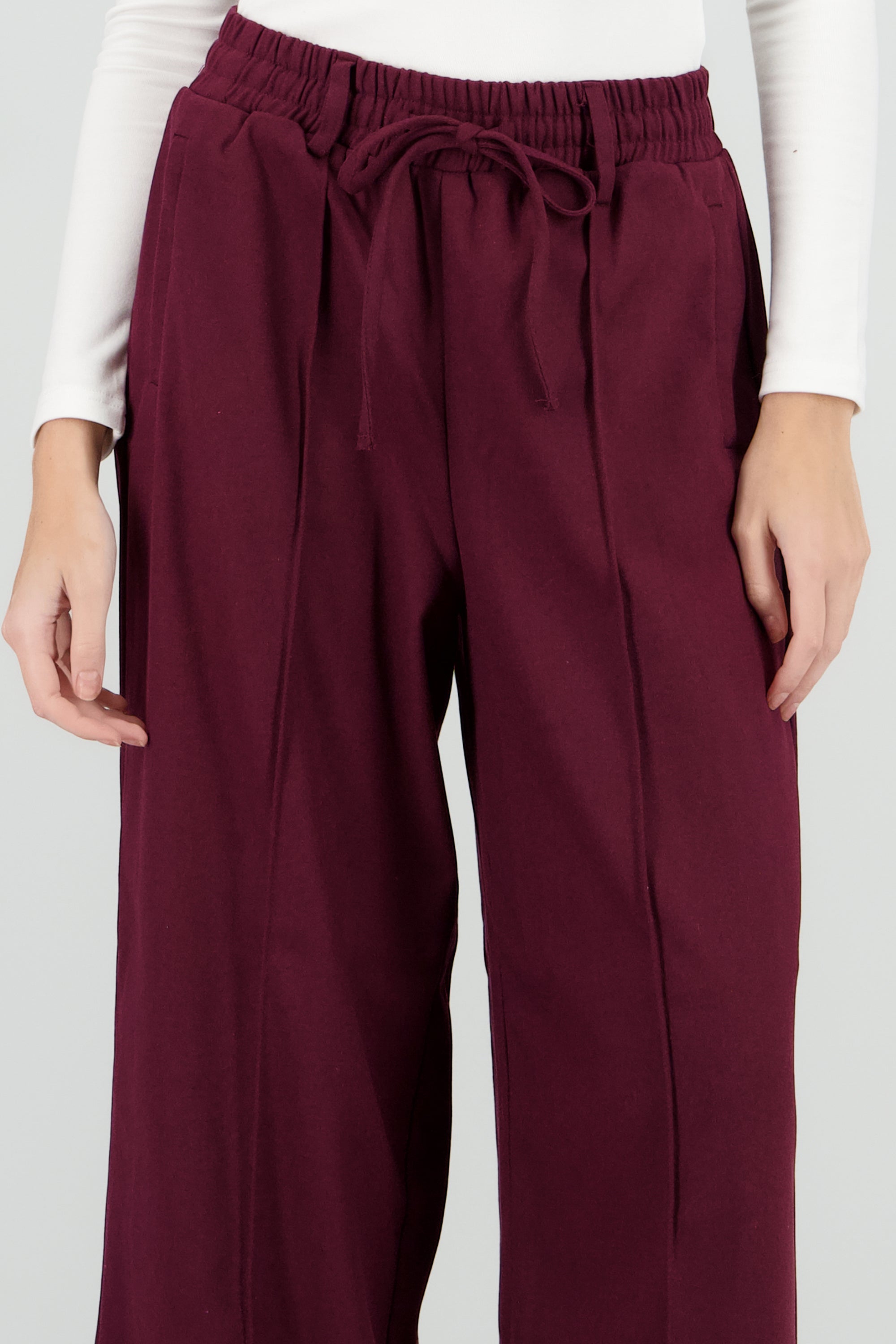 Pantalon amplio liso detalle resorte CIRUELA