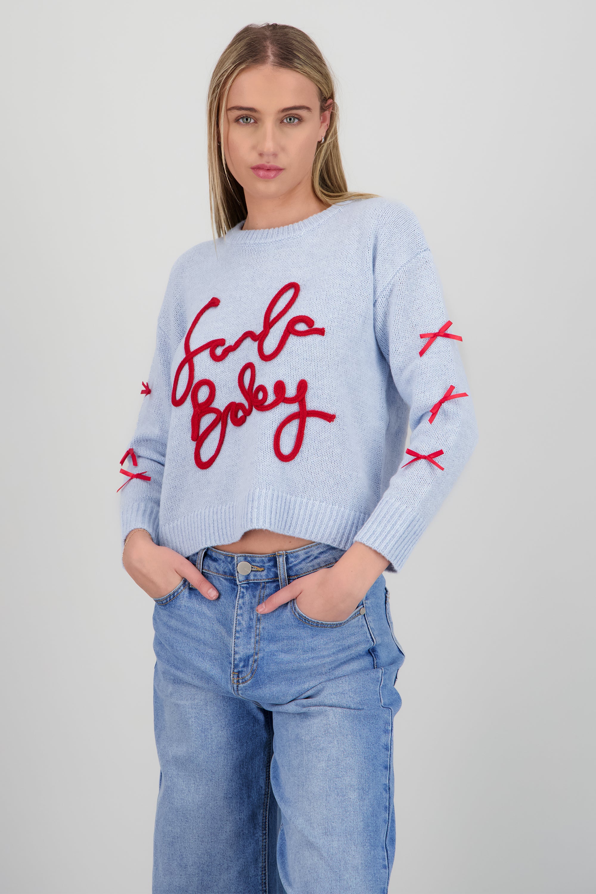 Sueter Santa Baby con moños AZUL CIELO