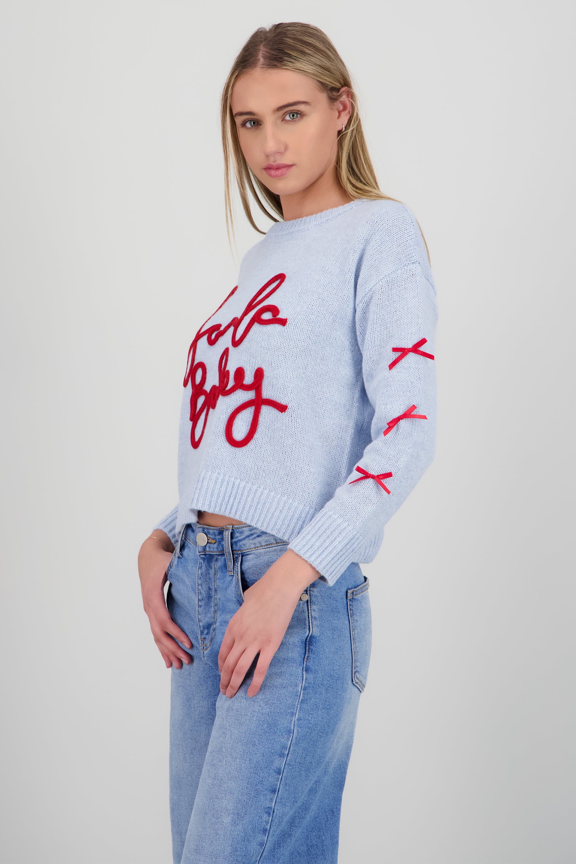 Sueter Santa Baby con moños AZUL CIELO