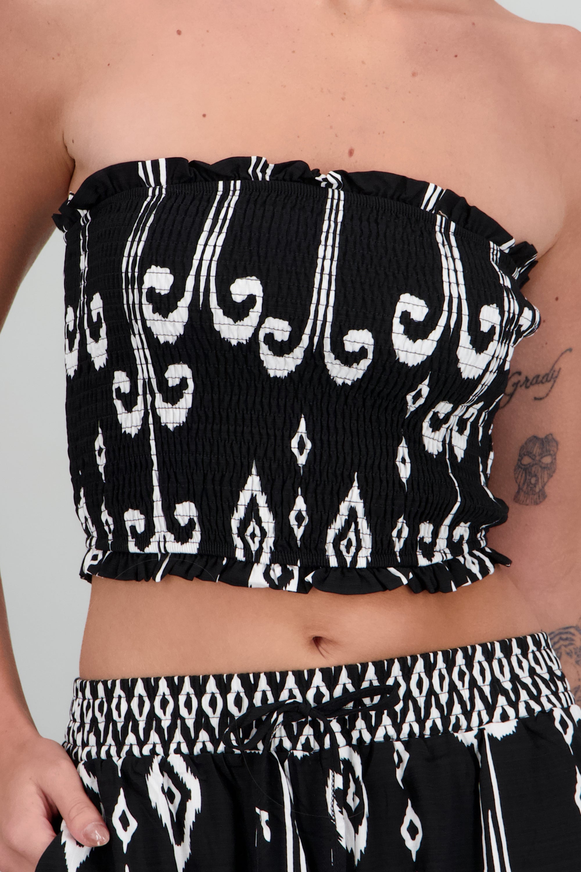 Top strapless estampado NEGRO