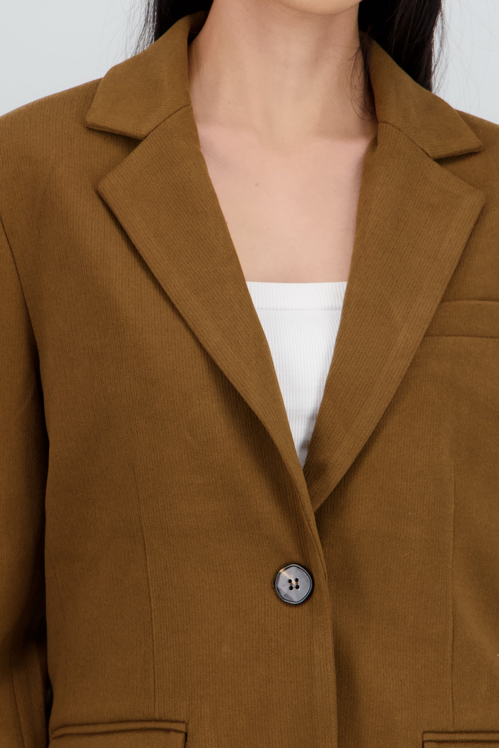 Saco oversized detalle textura CAFE