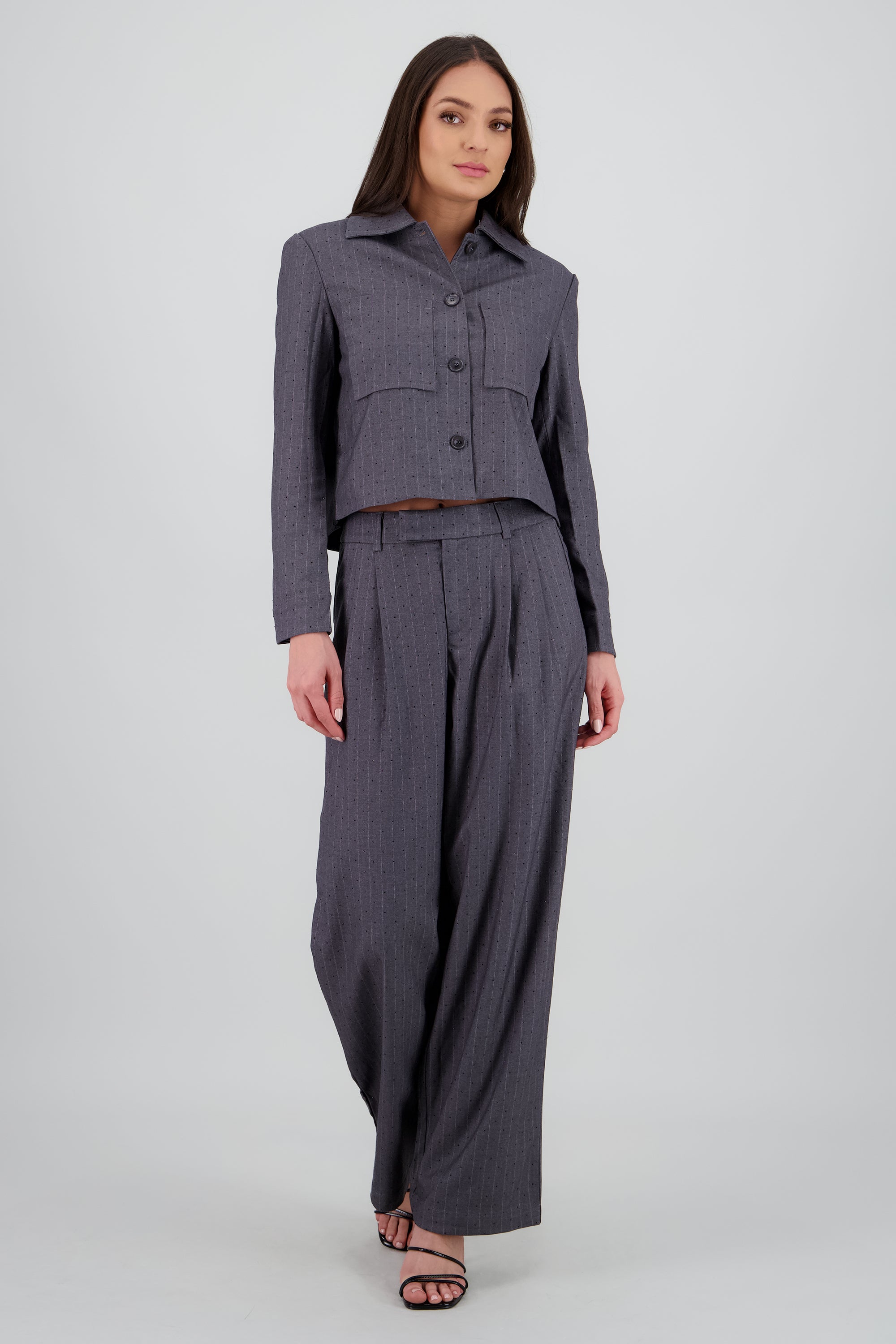 Pantalon amplio liso detalle tela GRIS