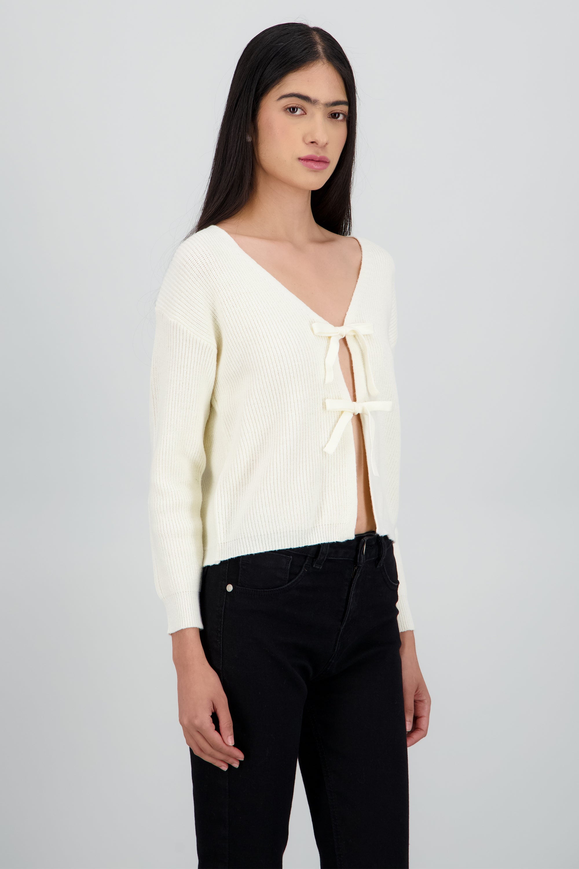 Sueter tejido detalle moños CREMA