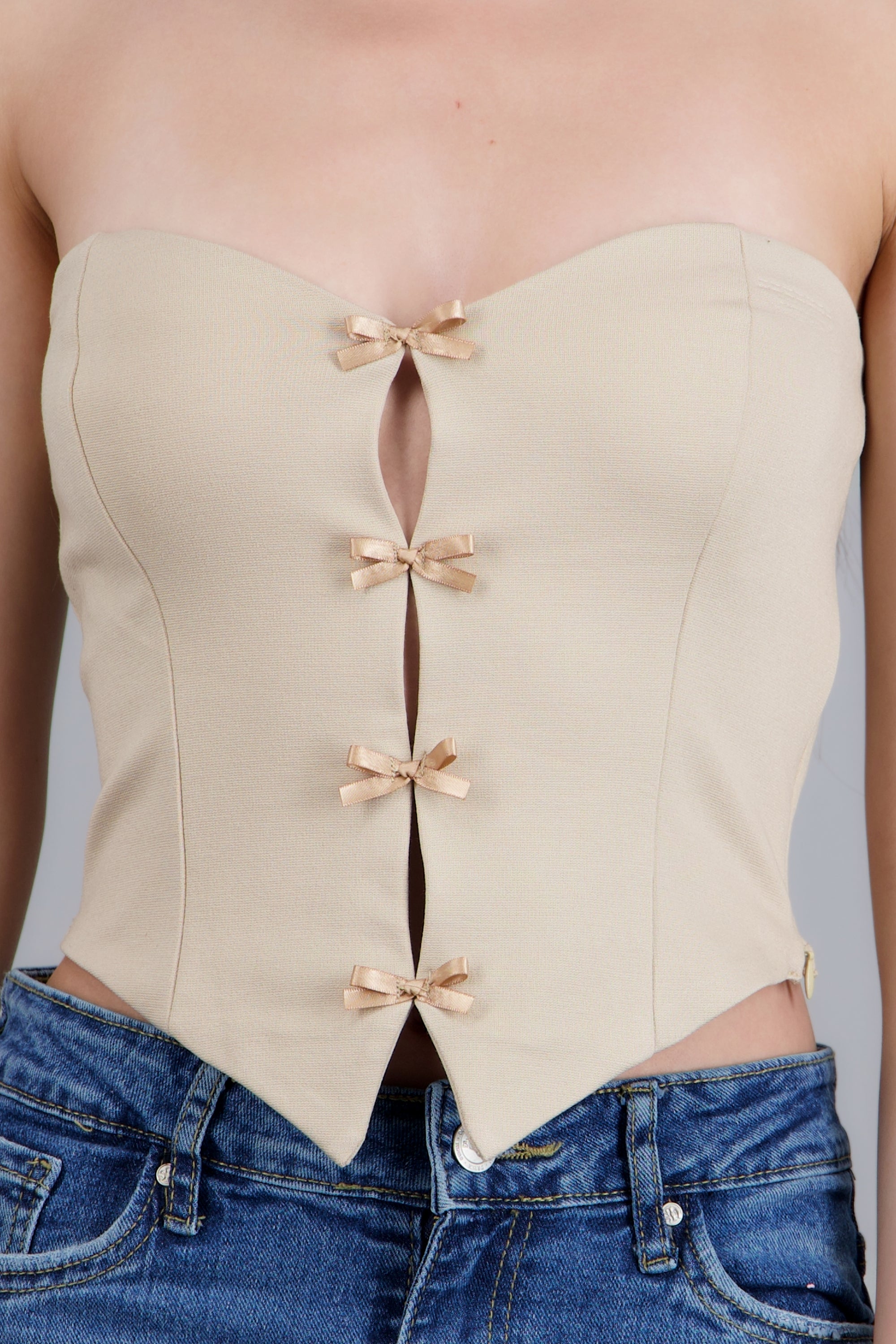 Top strapless detalle moños ARENA