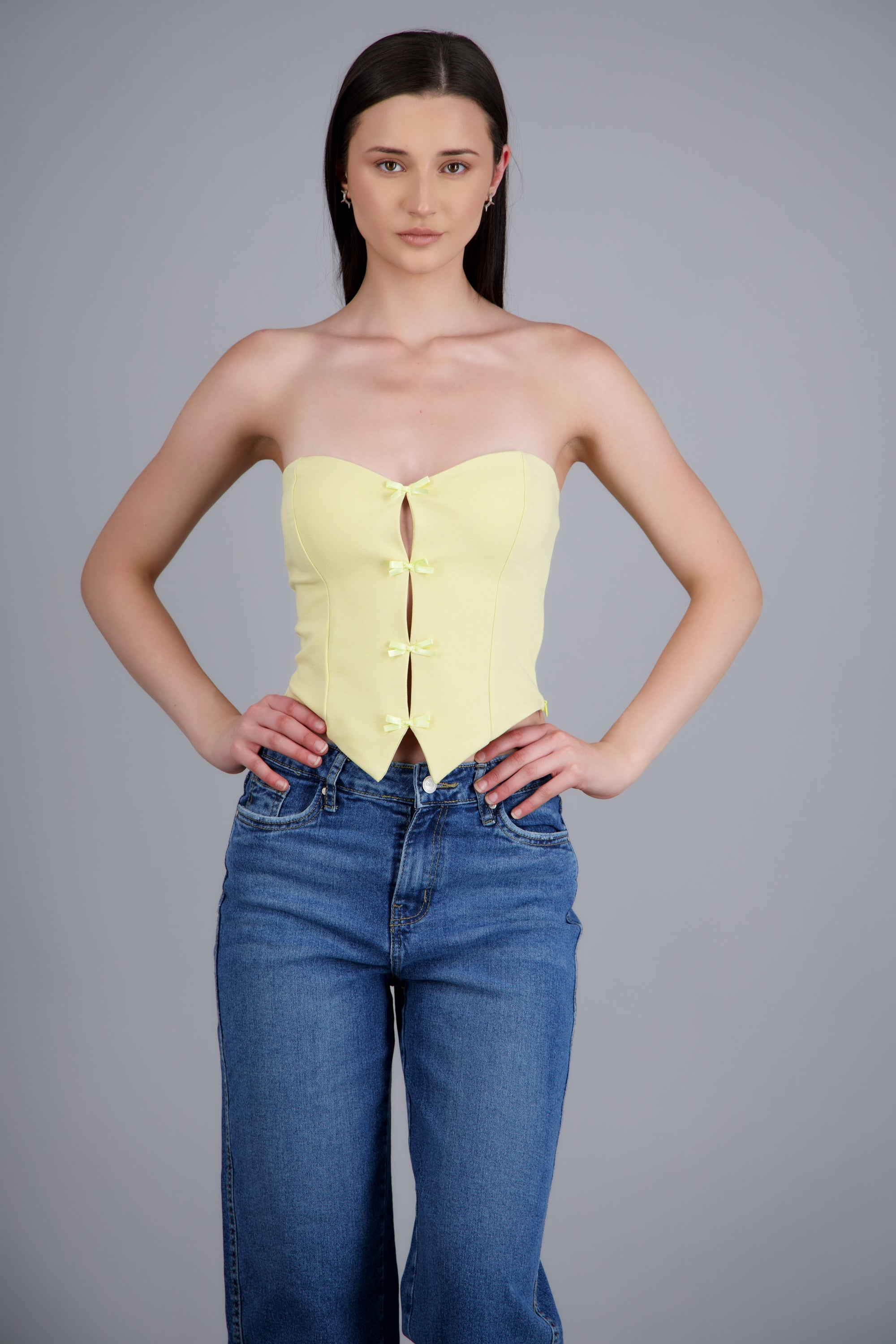Top strapless detalle moños AMARILLO PASTEL