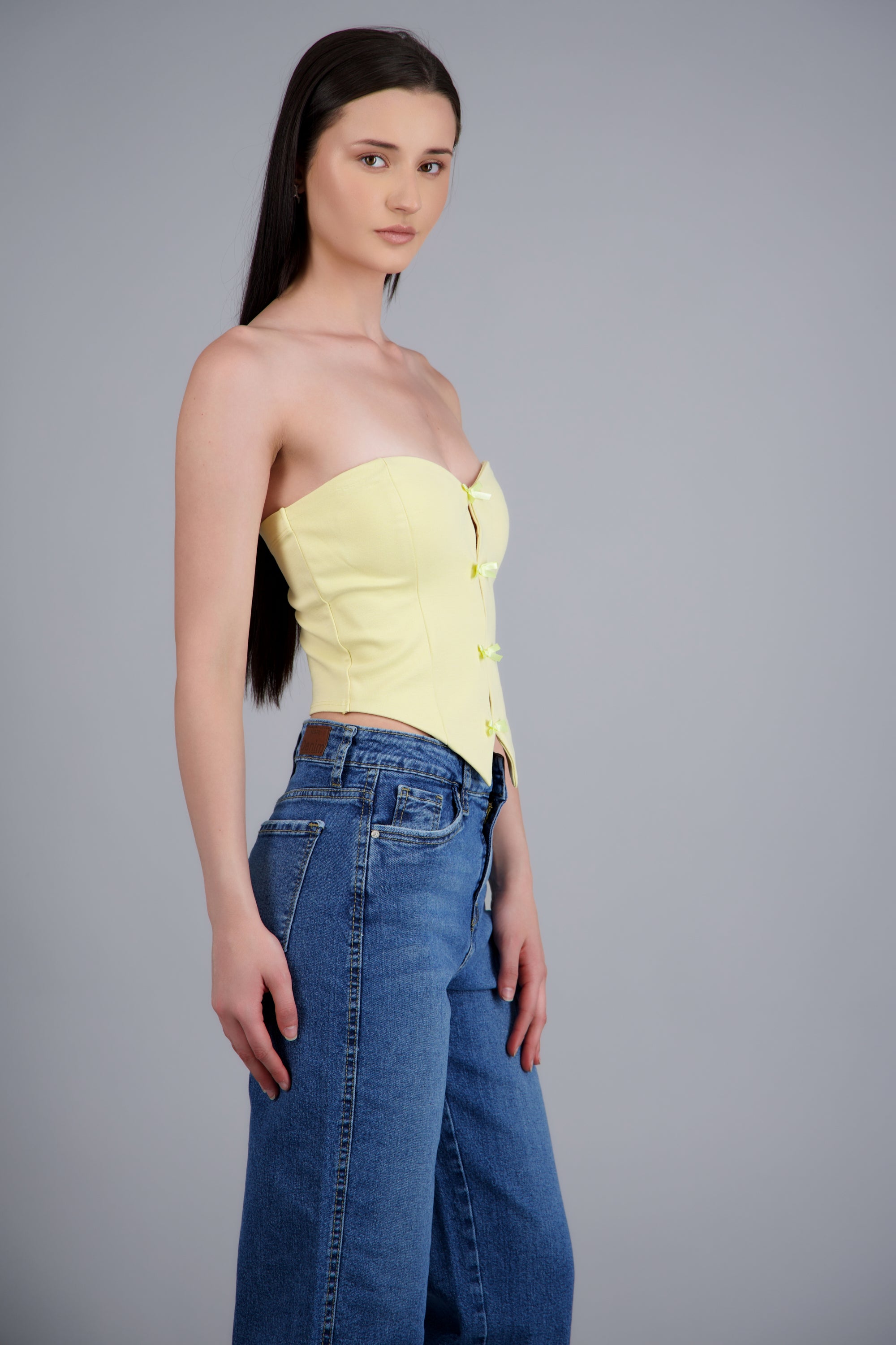 Top strapless detalle moños AMARILLO PASTEL