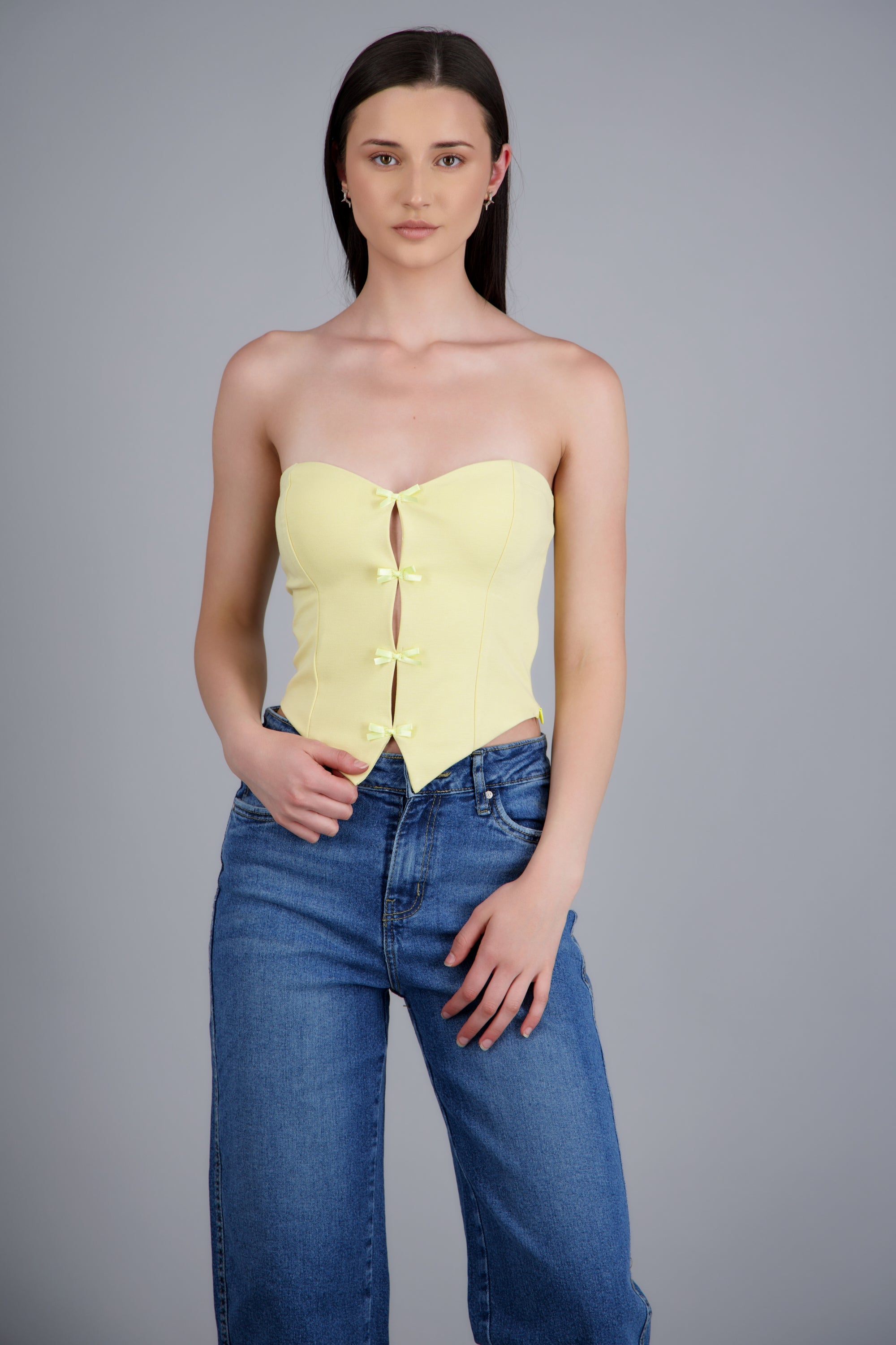 Top strapless detalle moños AMARILLO PASTEL