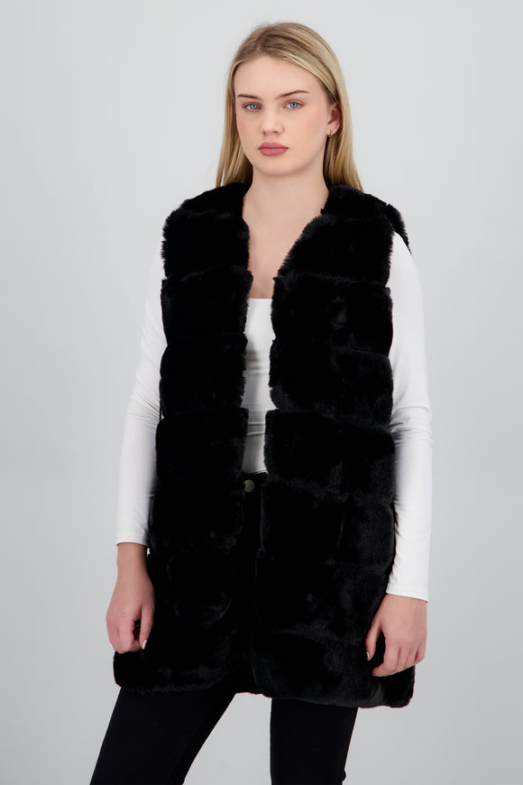 Chaleco largo peluche bloques