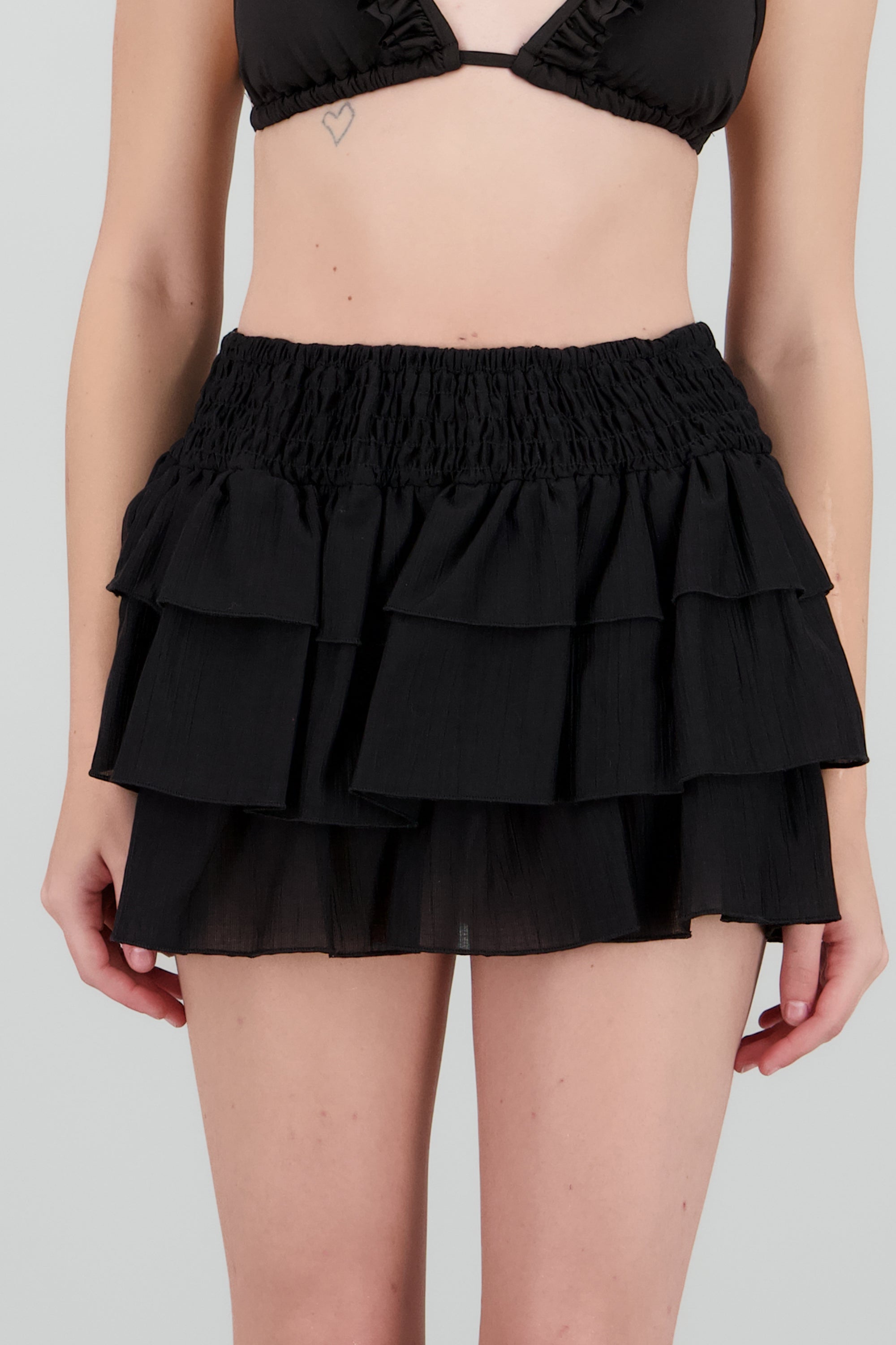 Falda mini olanes smock NEGRO