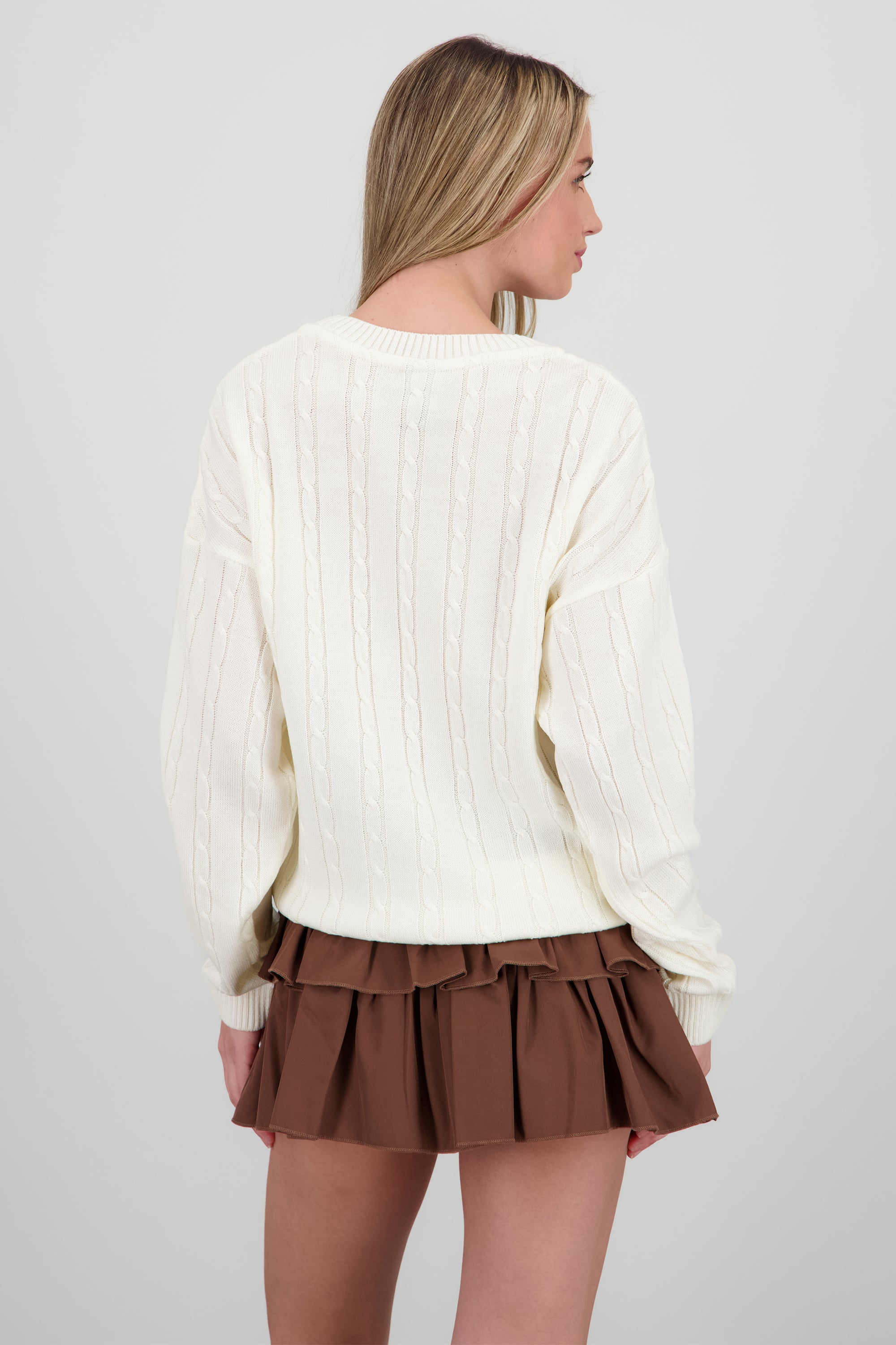 Sueter trenzado bordado playboy CREMA