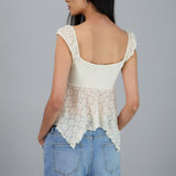 Blusa encaje asimetrica manga corta