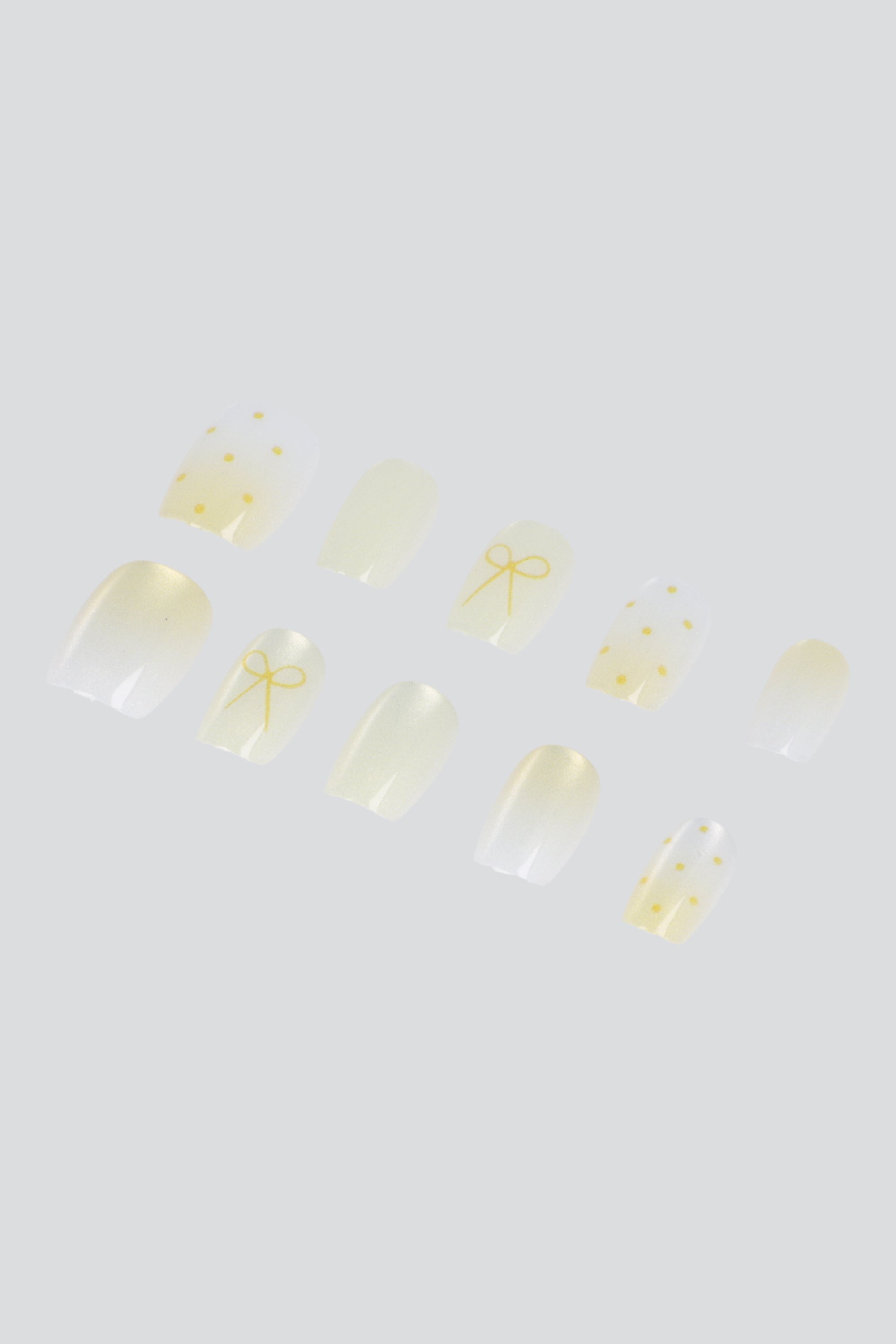 Set 10 uñas polka dots moño ojo de gato AMARILLO