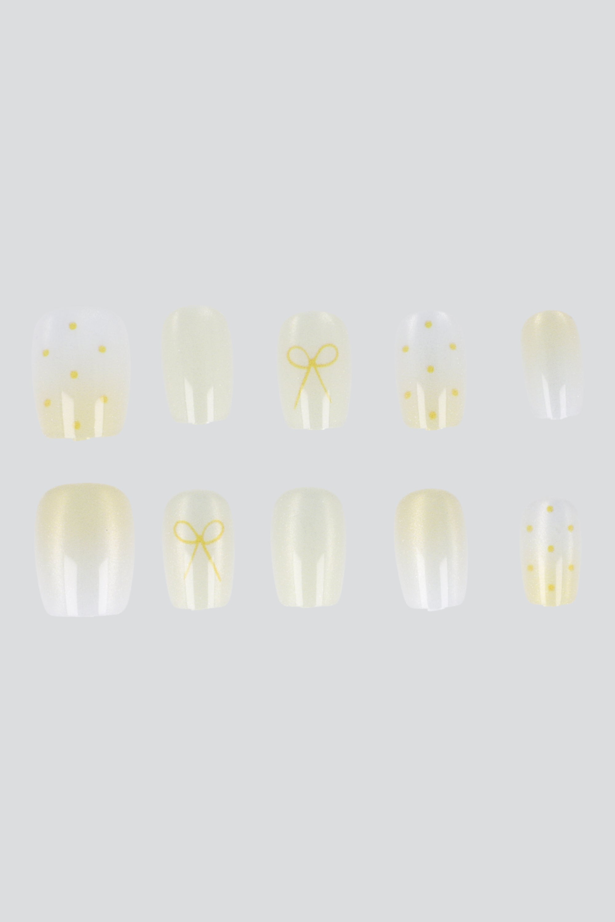 Set 10 uñas polka dots moño ojo de gato AMARILLO