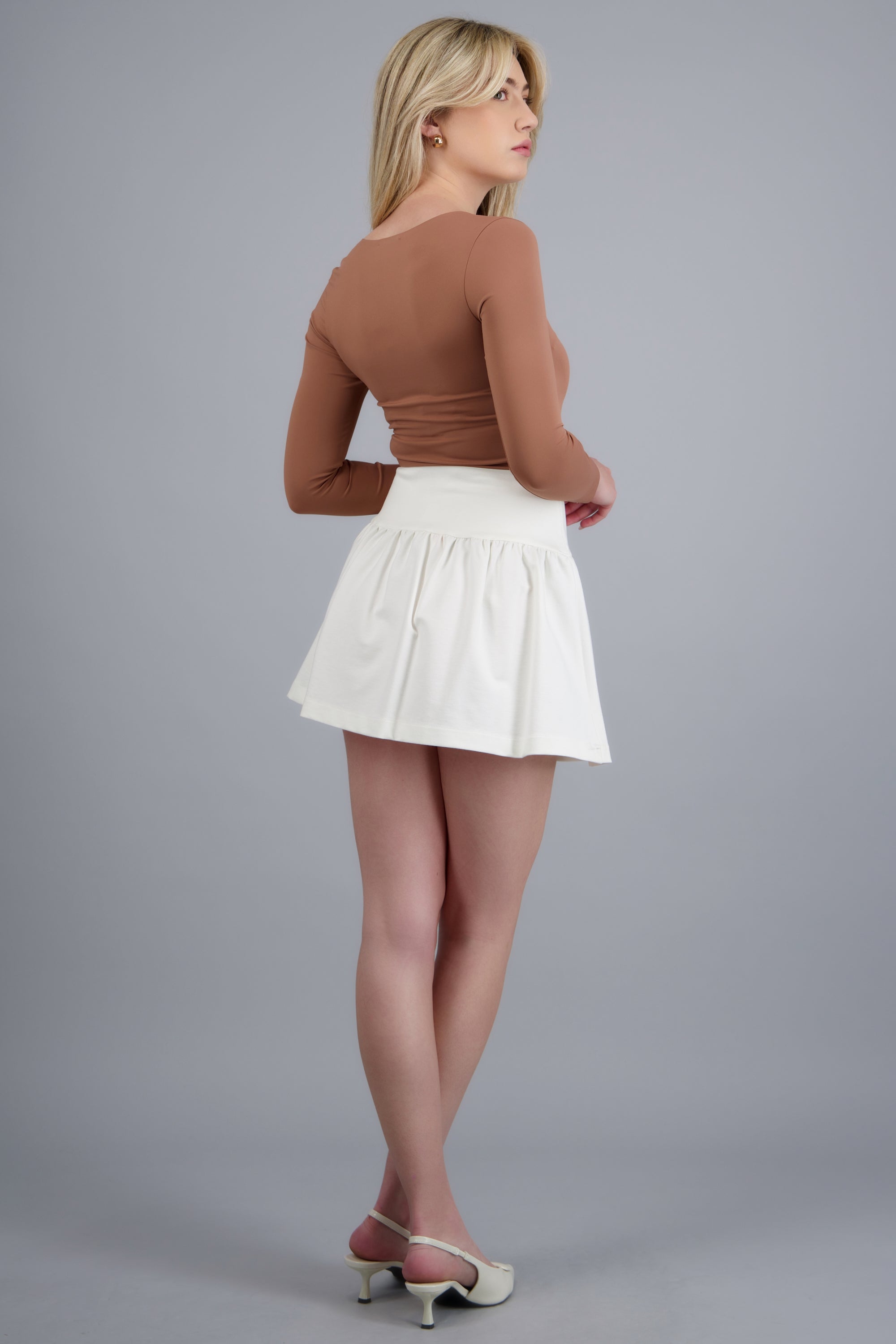Falda mini tacto suave HUESO