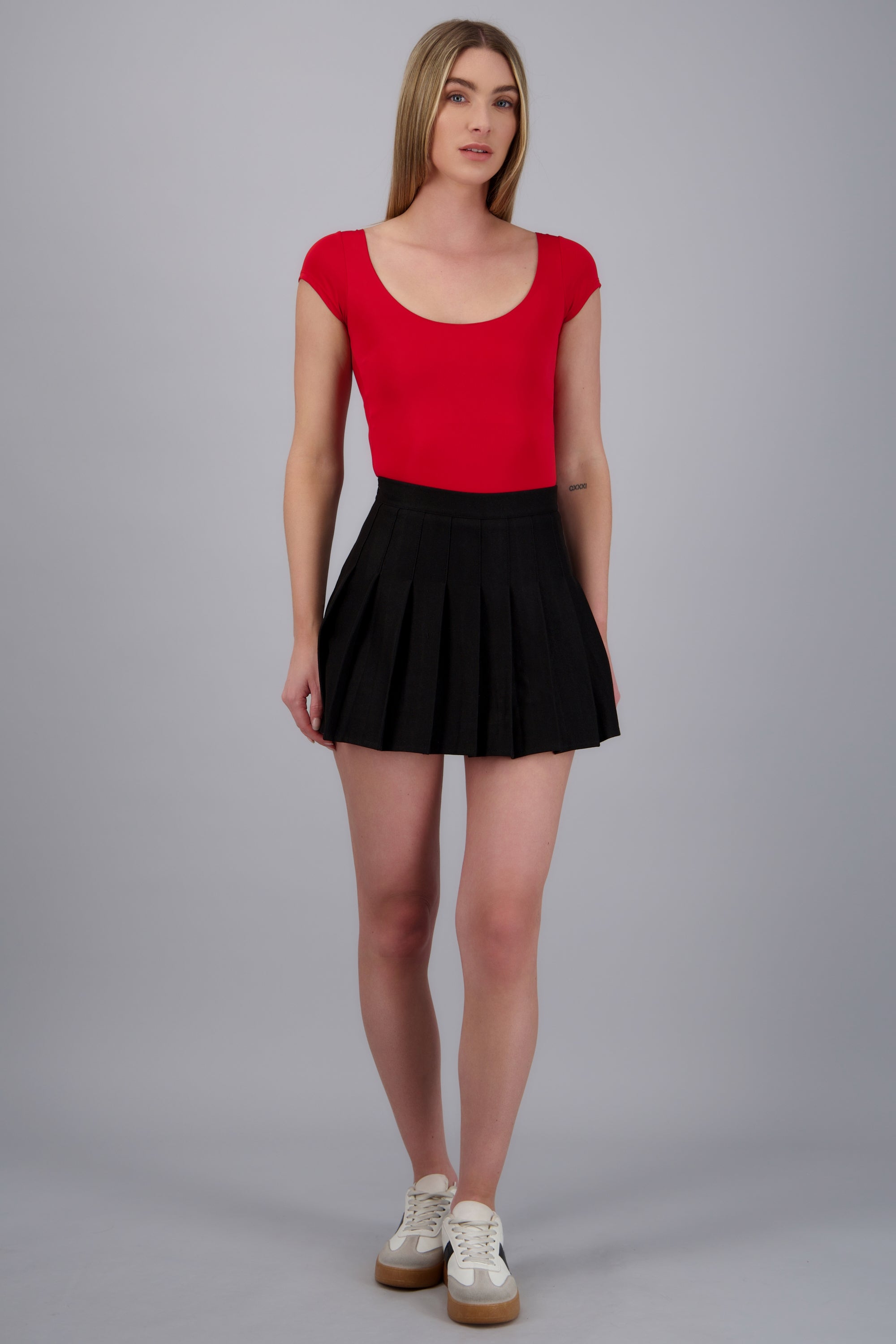 Mini falda tableada lisa NEGRO